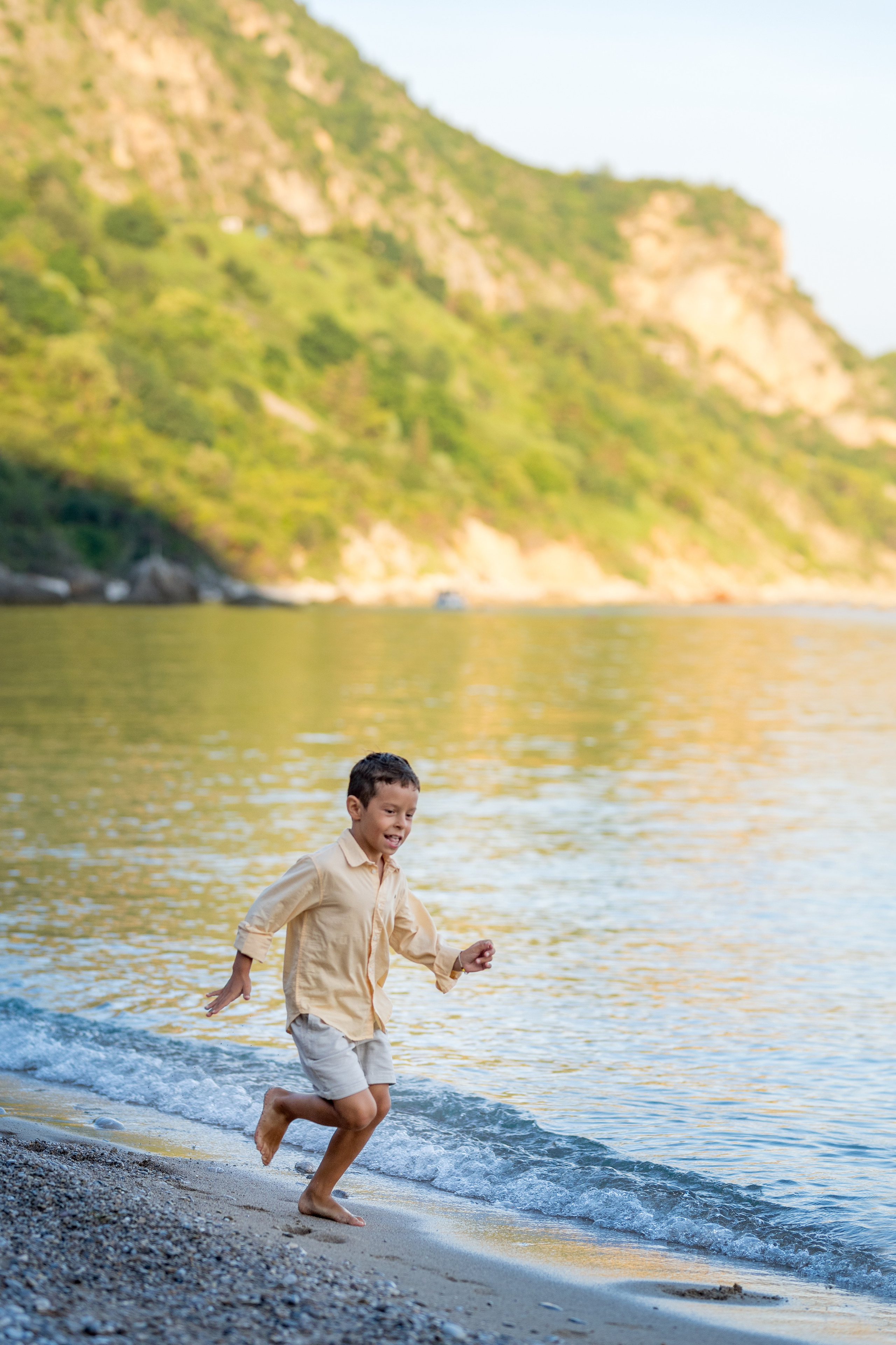 Photo session of a mother and son on the beach in Budva, Montenegro. Kate Khaldeeva photographer in Saratov