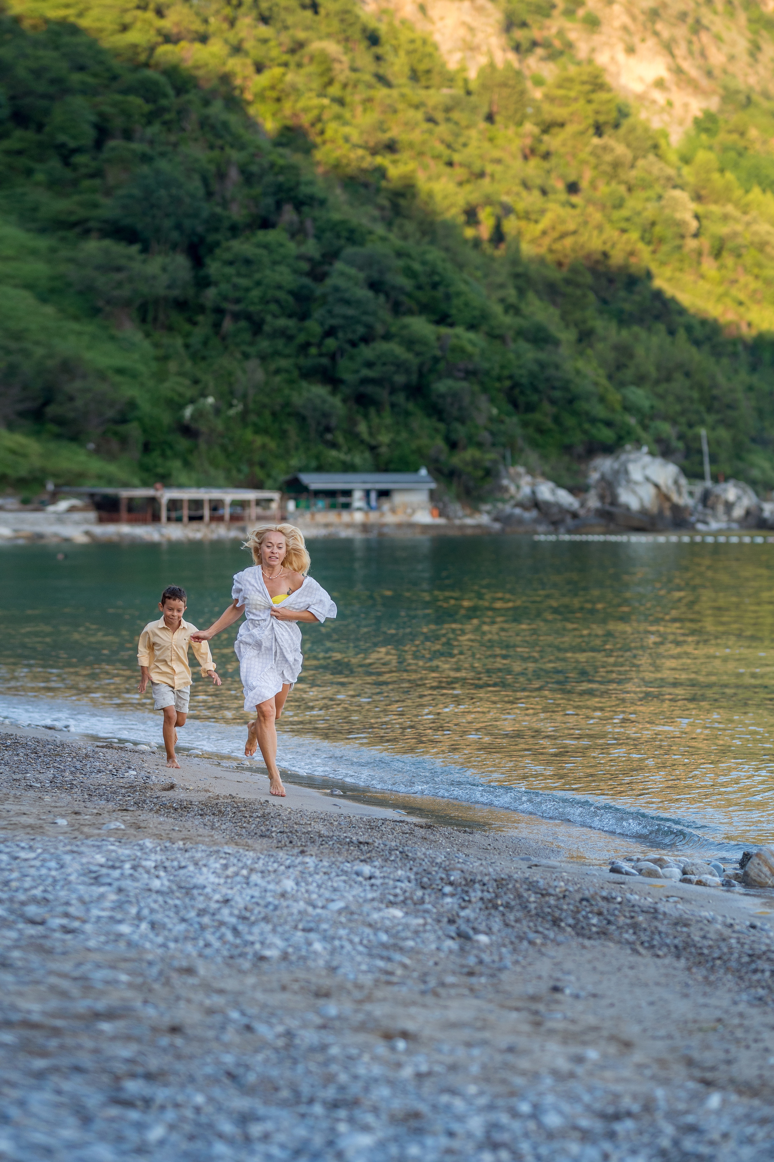 Photo session of a mother and son on the beach in Budva, Montenegro. Kate Khaldeeva photographer in Saratov