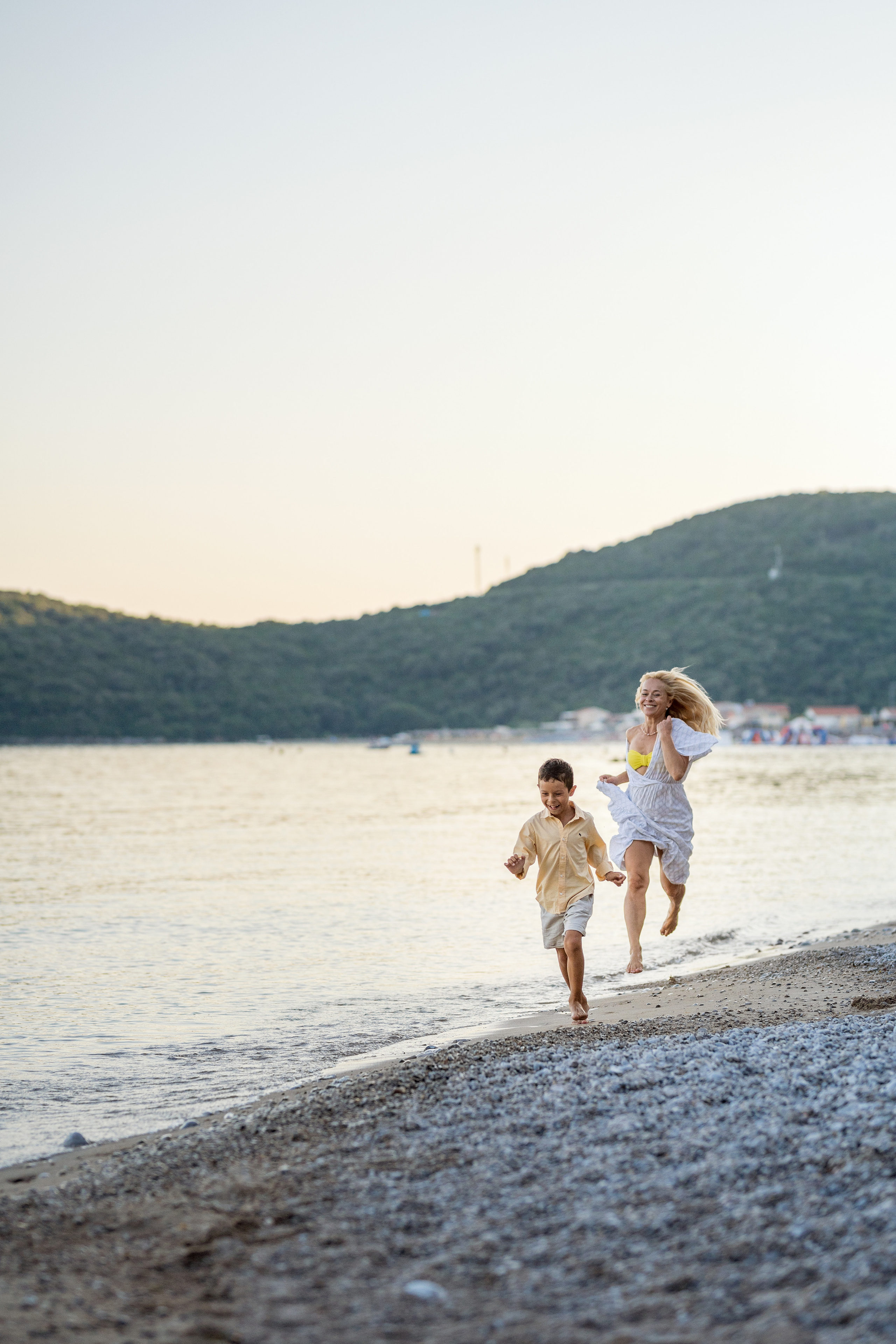 Photo session of a mother and son on the beach in Budva, Montenegro. Kate Khaldeeva photographer in Saratov