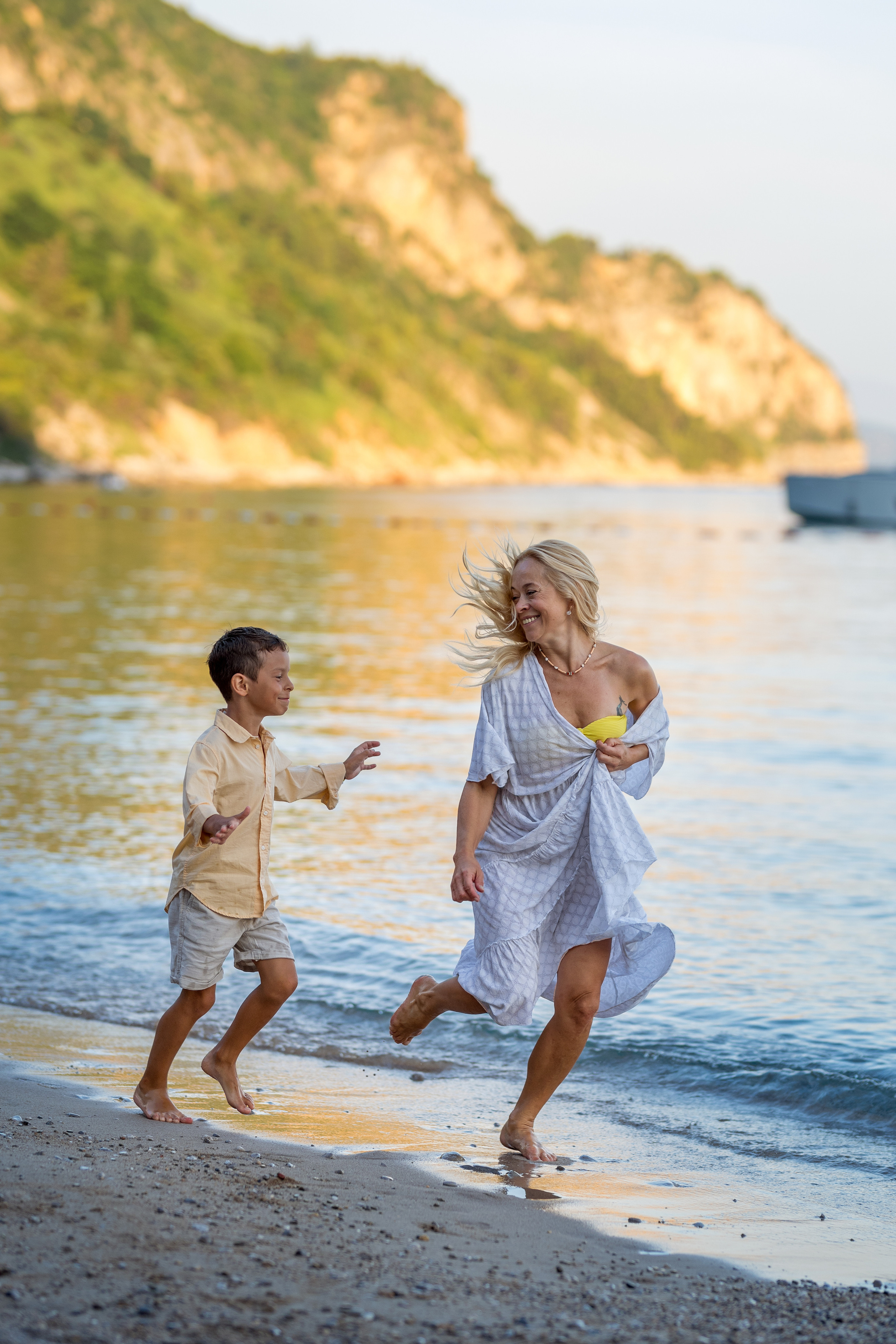 Photo session of a mother and son on the beach in Budva, Montenegro. Kate Khaldeeva photographer in Saratov