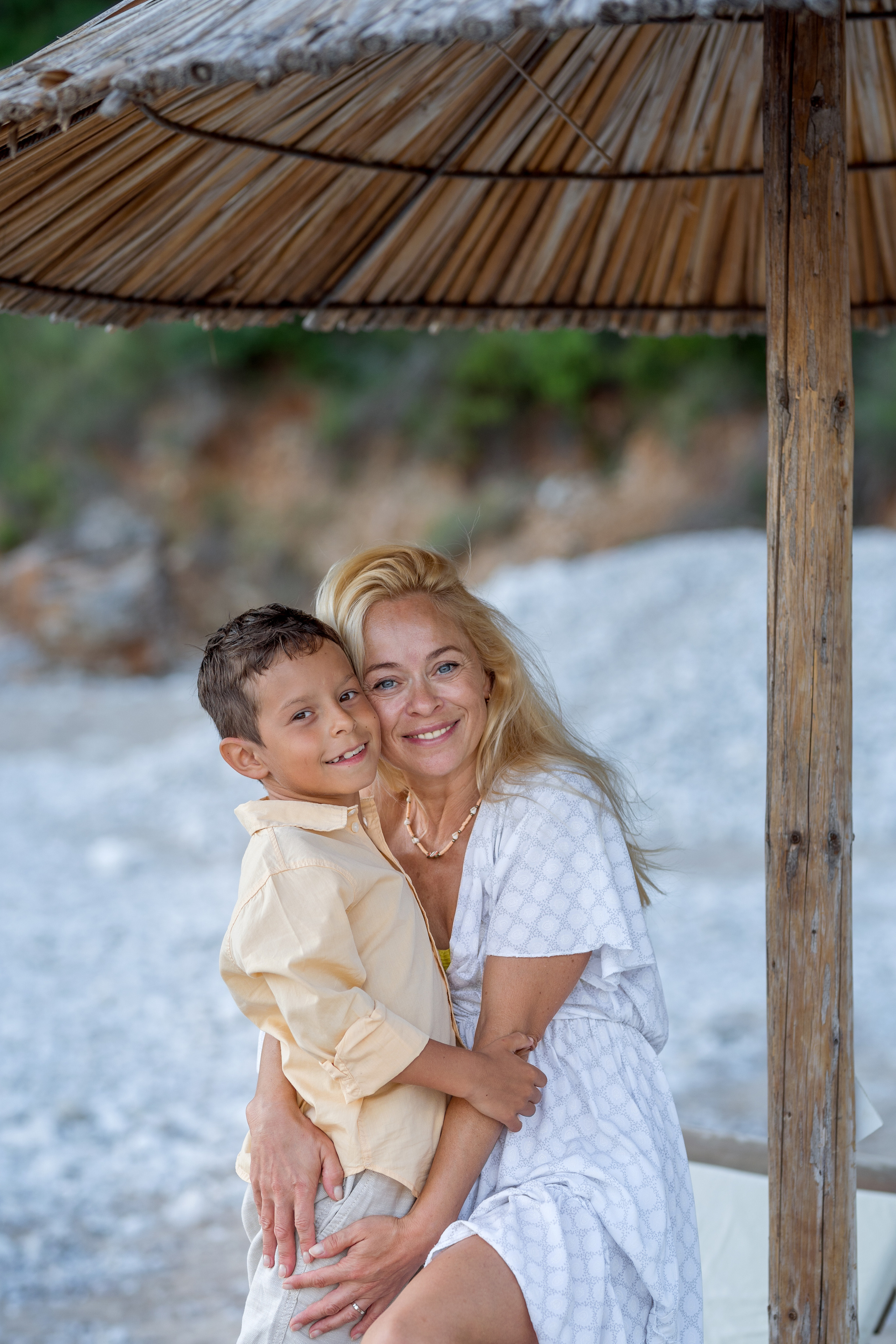 Photo session of a mother and son on the beach in Budva, Montenegro. Kate Khaldeeva photographer in Saratov