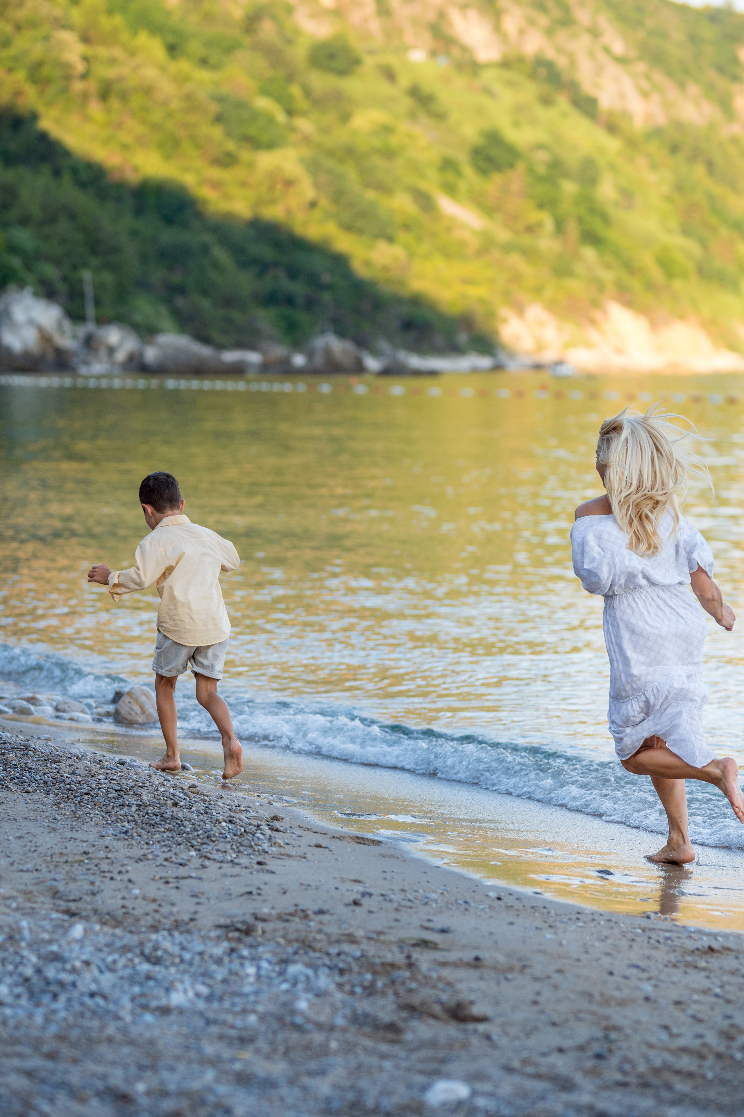 Photo session of a mother and son on the beach in Budva, Montenegro. Kate Khaldeeva photographer in Saratov