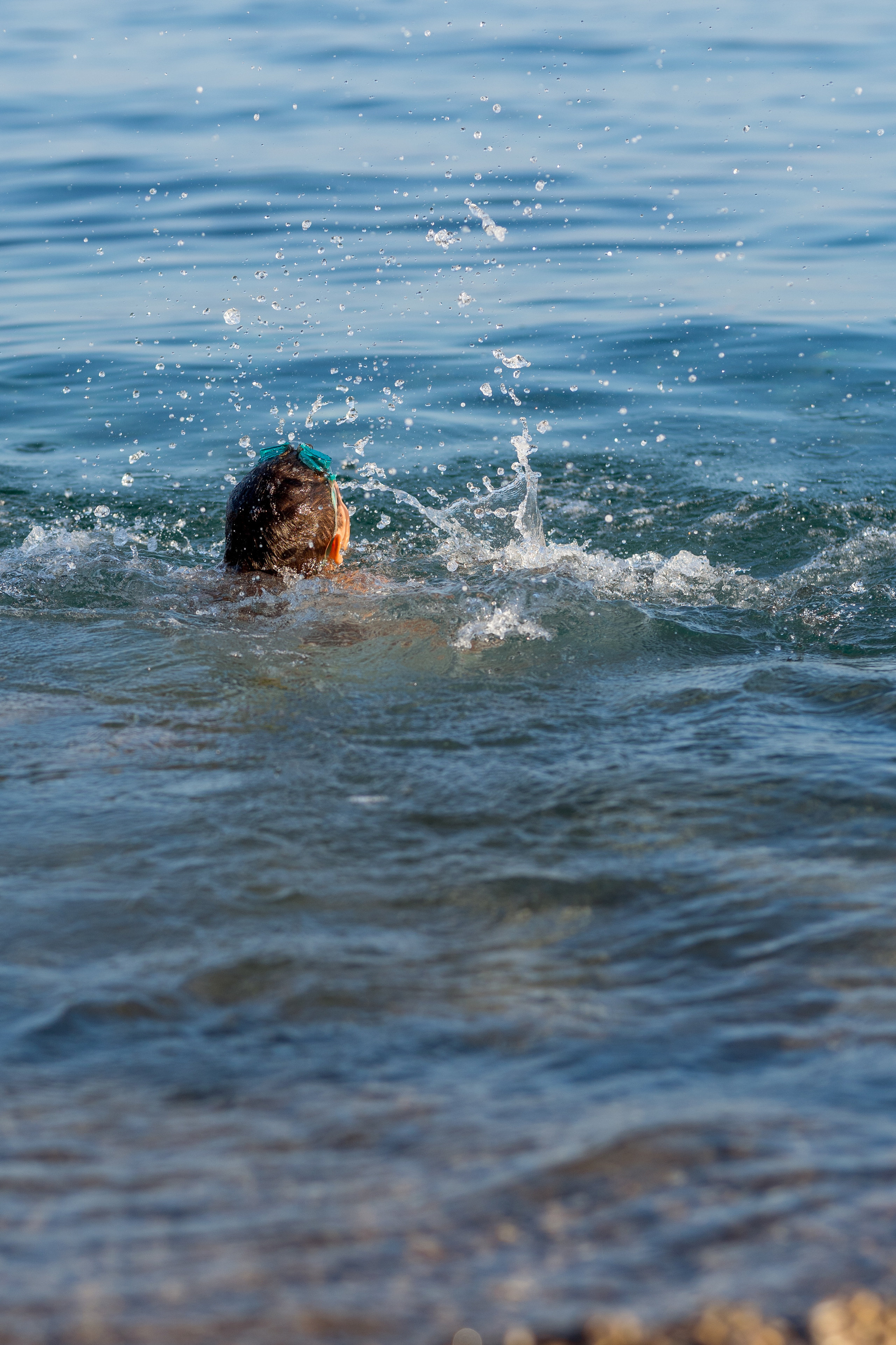 Photo session of a mother and son on the beach in Budva, Montenegro. Kate Khaldeeva photographer in Saratov