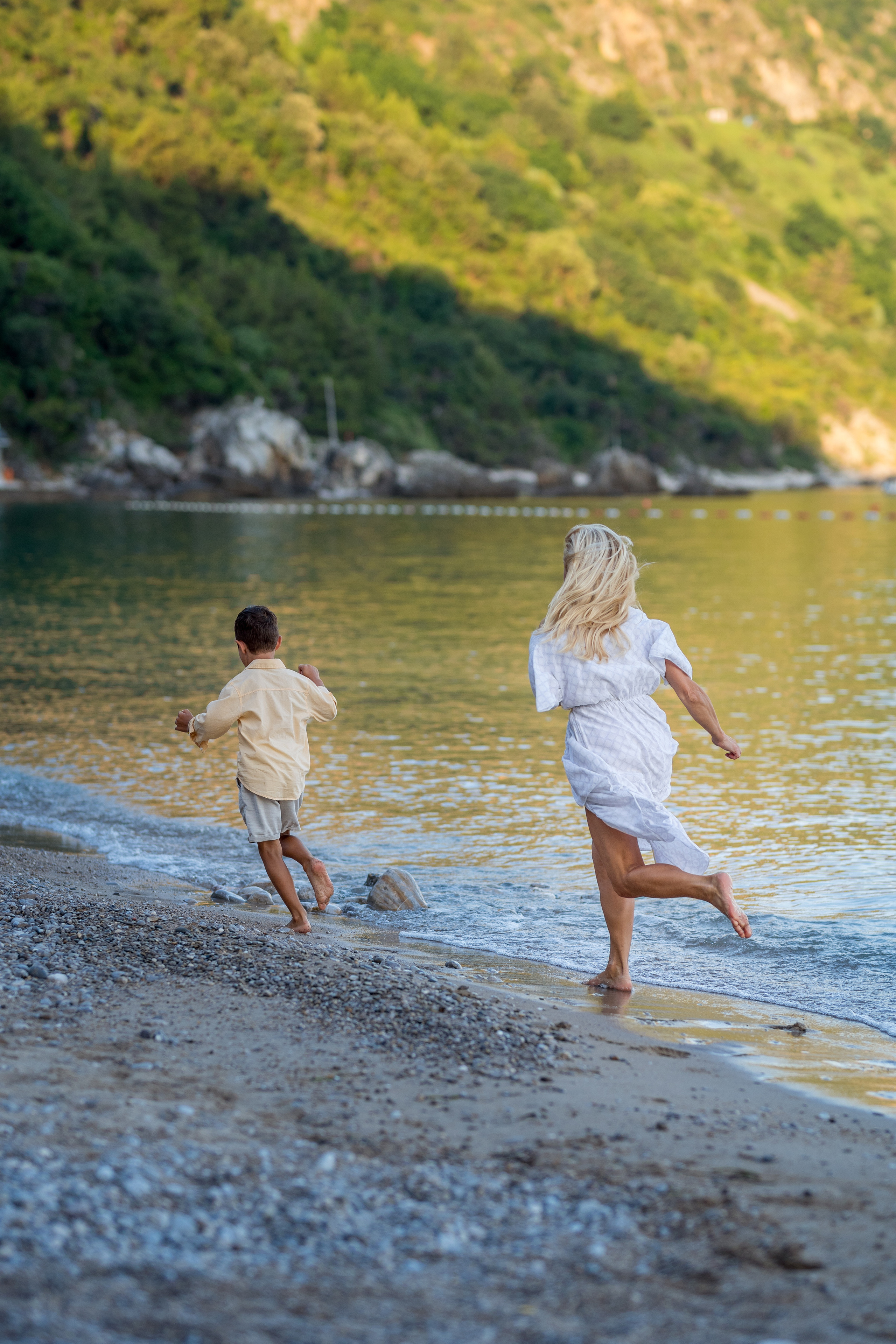 Photo session of a mother and son on the beach in Budva, Montenegro. Kate Khaldeeva photographer in Saratov