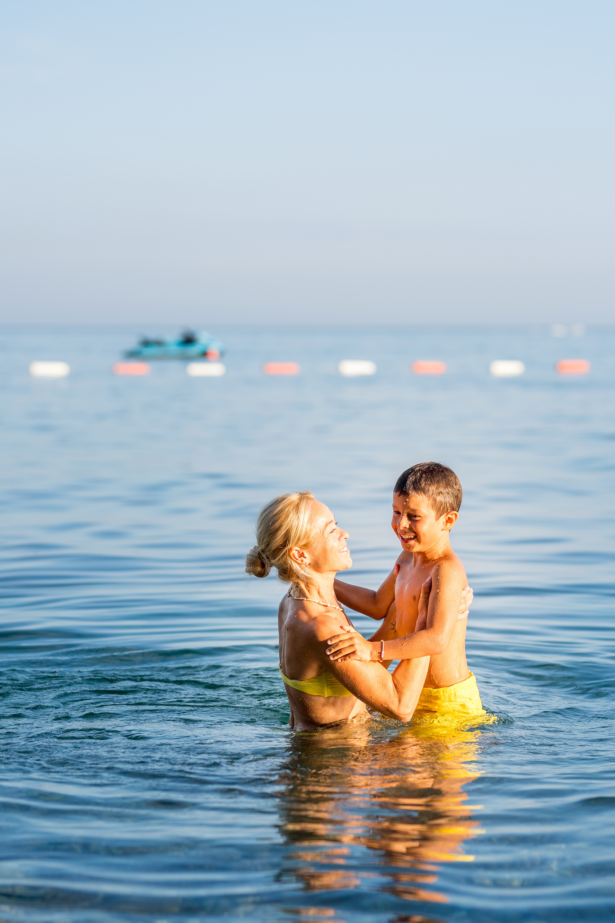 Photo session of a mother and son on the beach in Budva, Montenegro. Kate Khaldeeva photographer in Saratov
