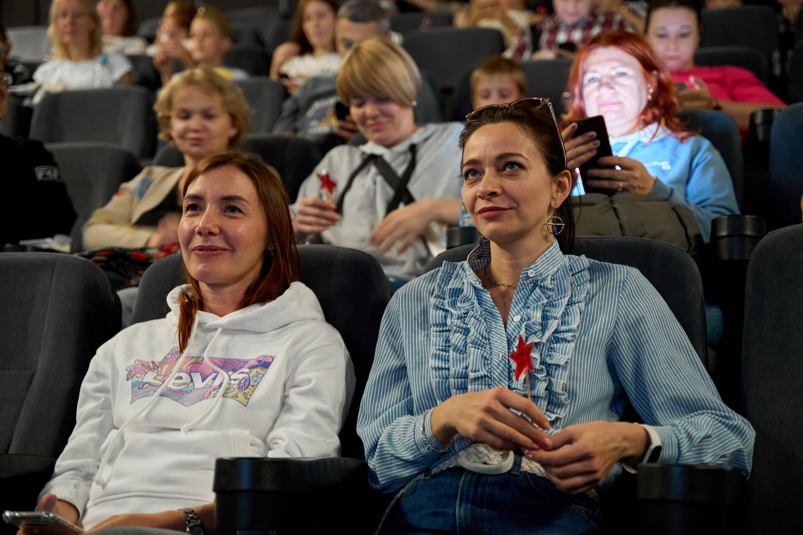 Spectators at the screening of the film “One Hundred Years Ahead”