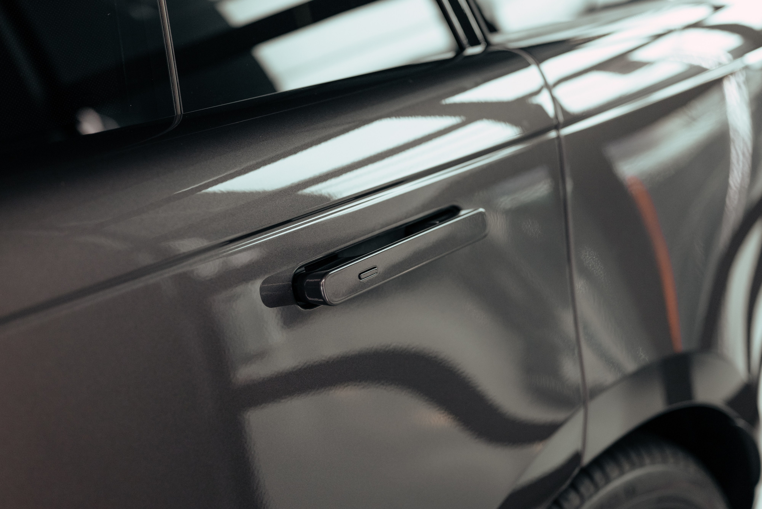 Range Rover long brown on white. DeLorein