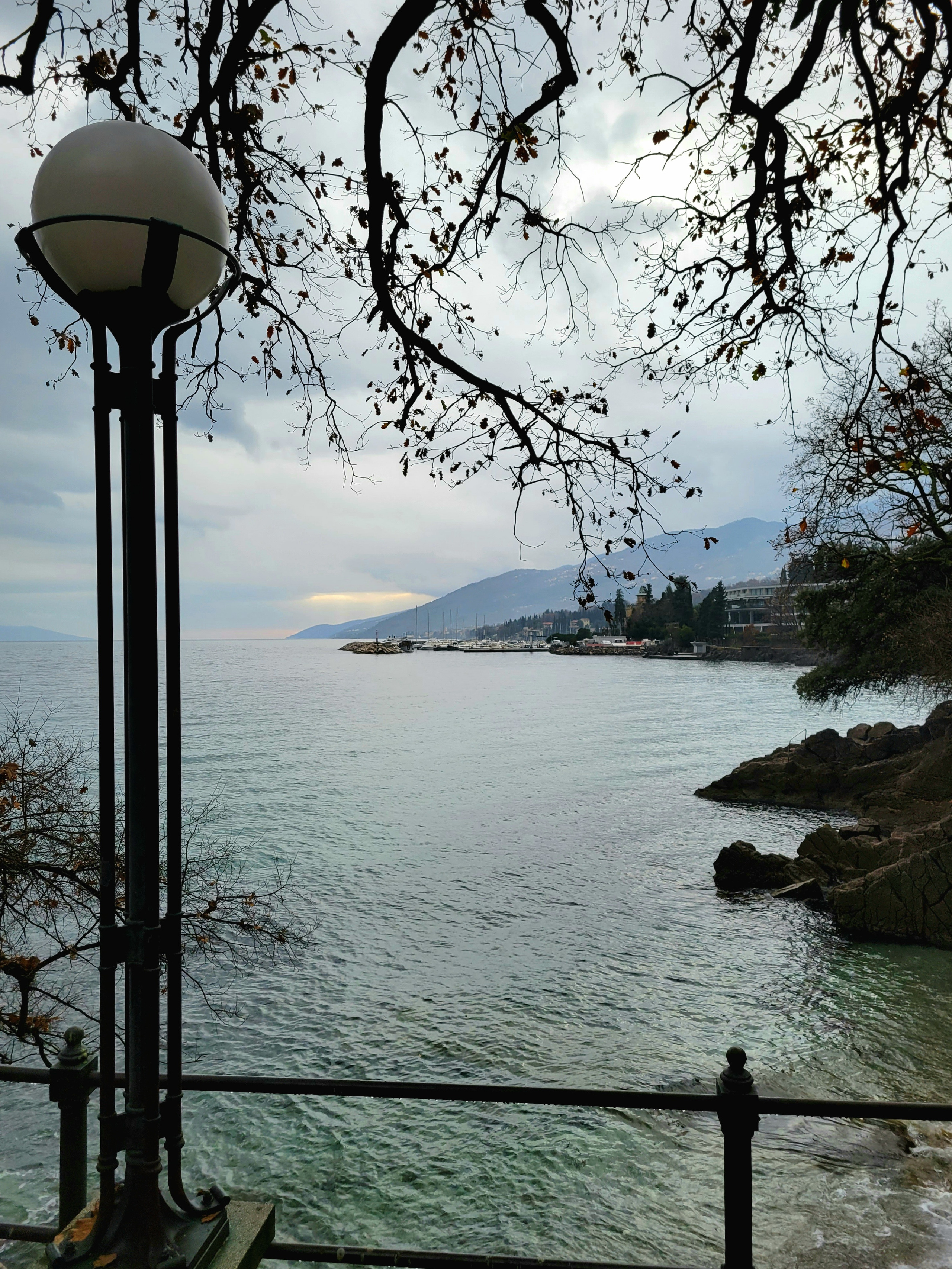 Promenade is going along cliffs and small bays