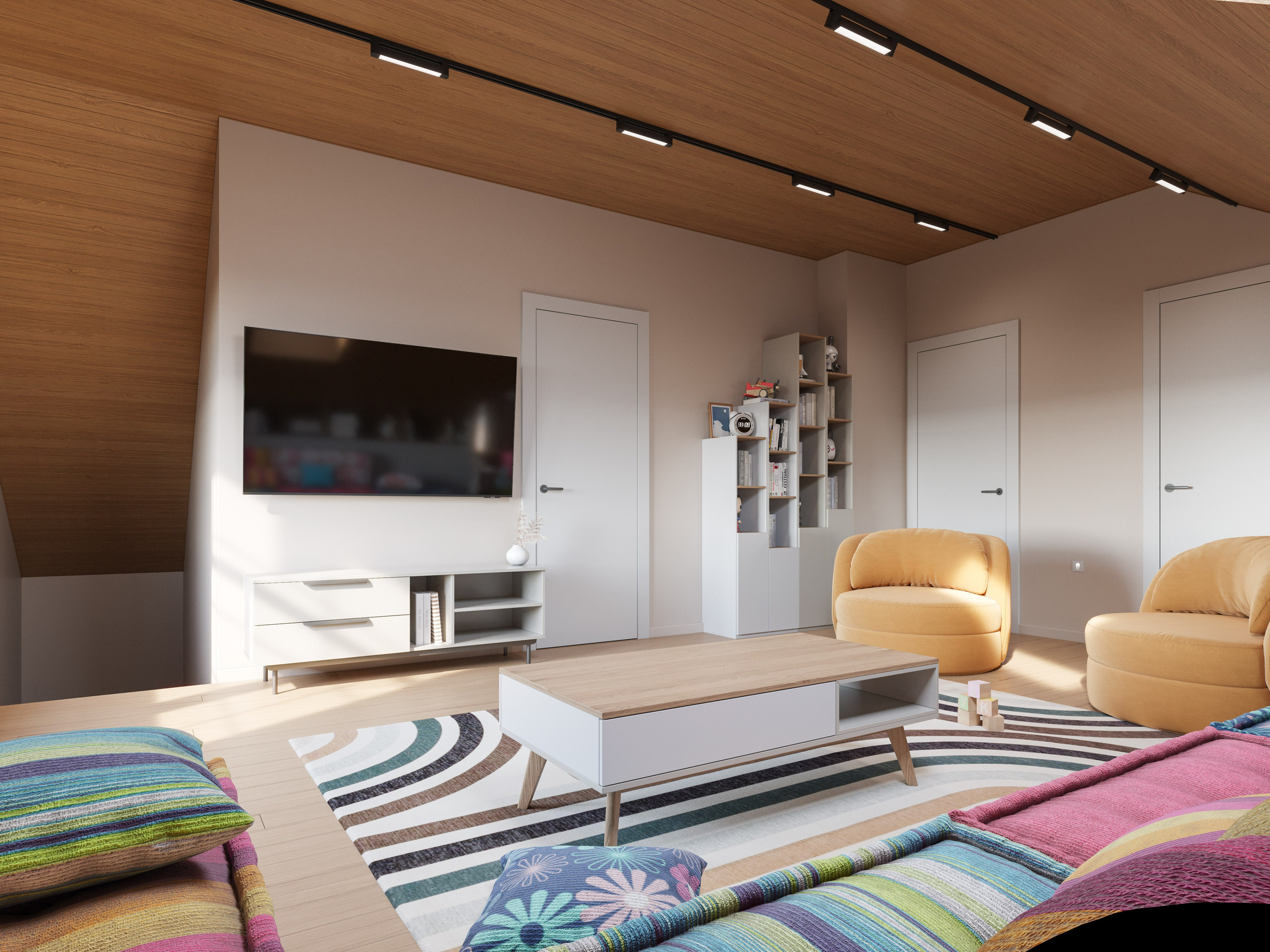 Зона отдыха на мансардном этаже с ярким диваном в загородном доме