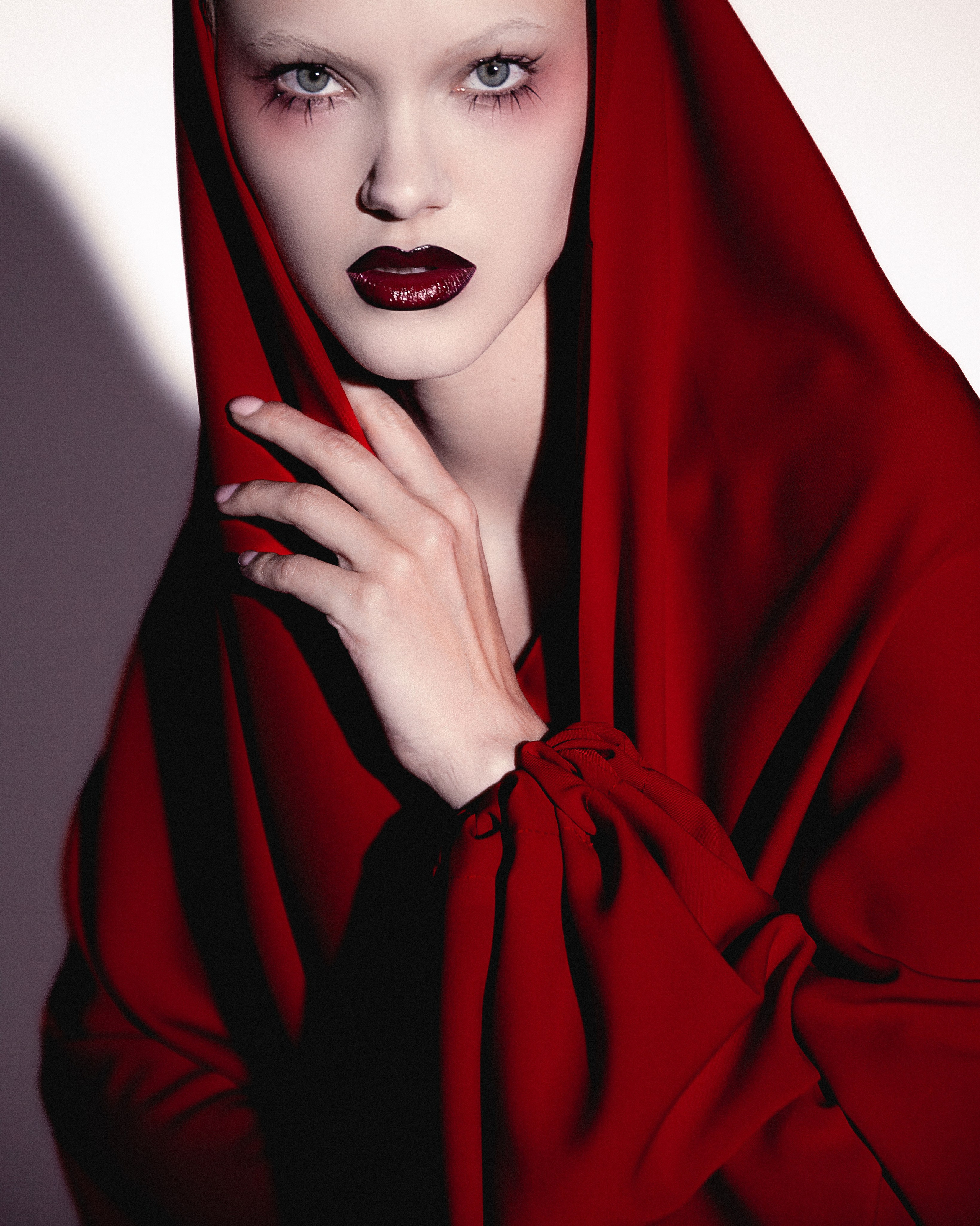 Red. Photographer. Producer. Retoucher