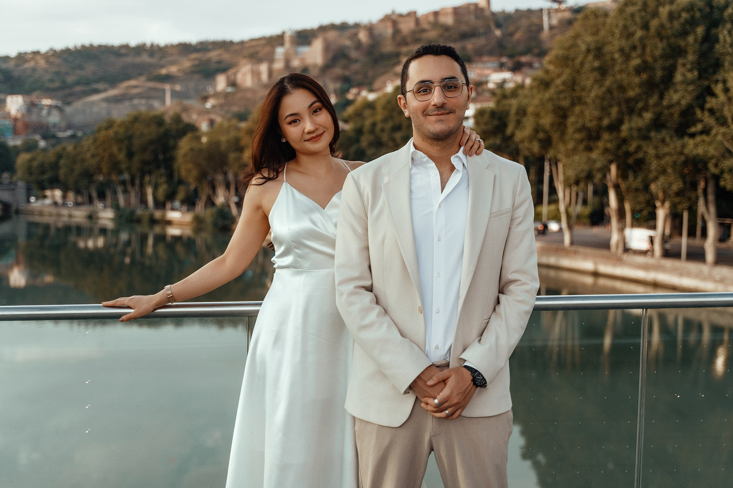 Alaeddine & Matika on the Peace Bridge in Tbilisi. Photographer Sergey Otkrytyi in Batumi & Tbilisi