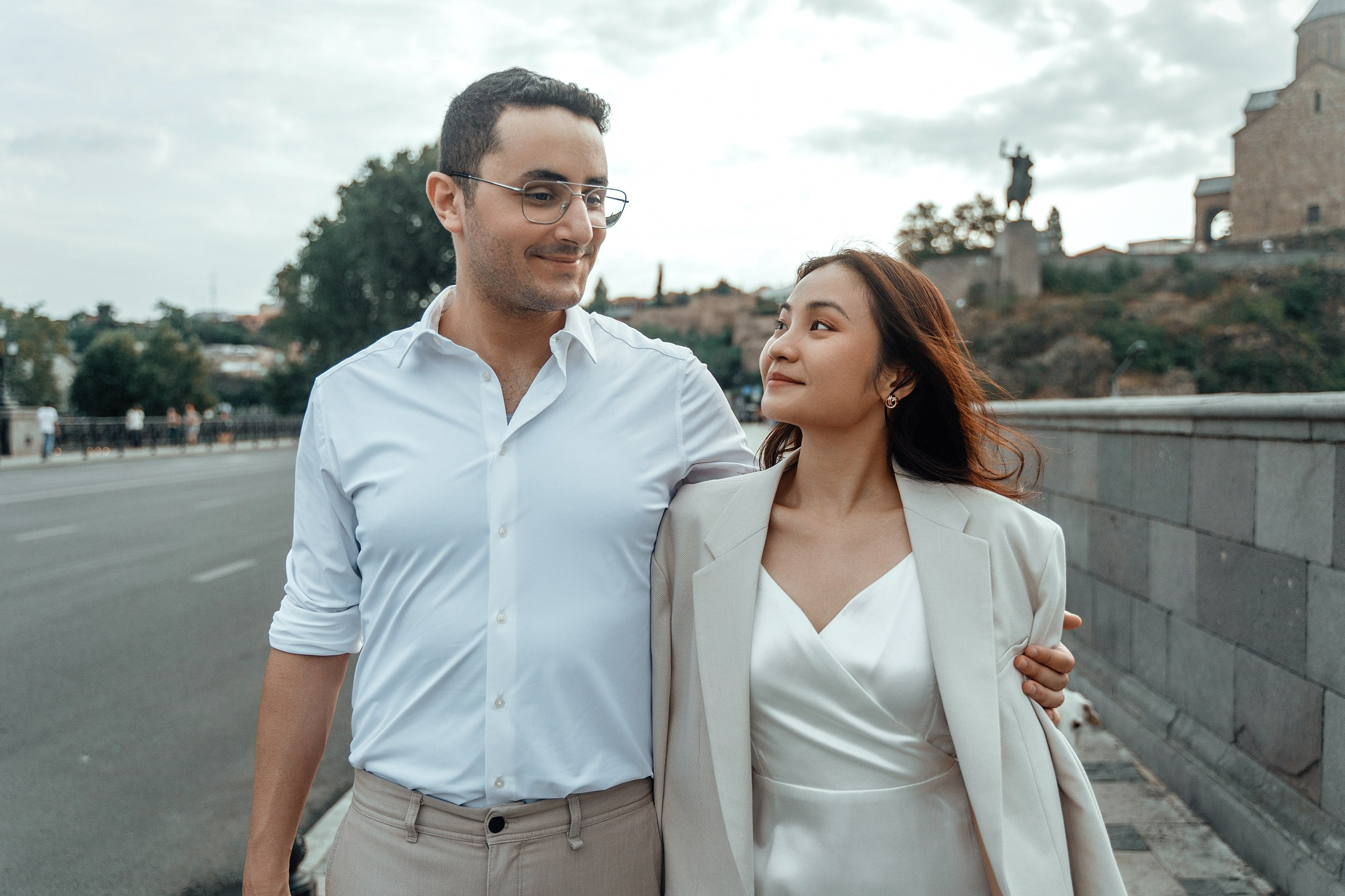 Alaeddine & Matika on the Peace Bridge in Tbilisi. Photographer Sergey Otkrytyi in Batumi & Tbilisi