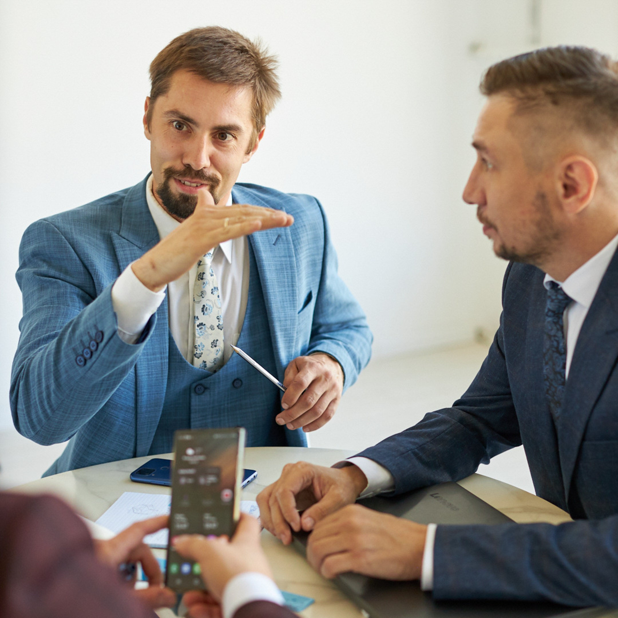 Business meeting conversation in the office - photographer Andrey DuninBusiness meeting conversation in the office - photographer Andrey Dunin