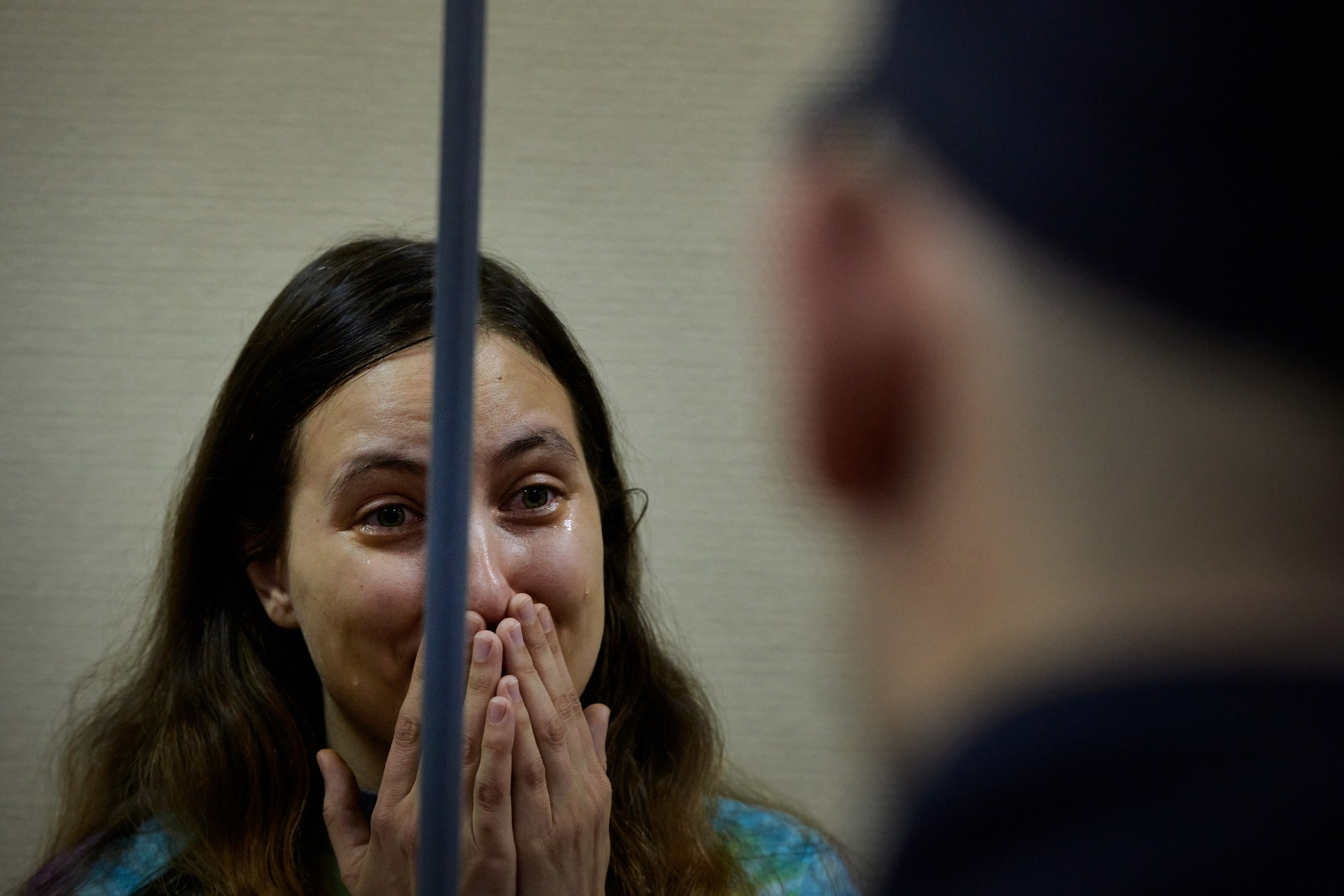 Sasha is seen crying as she says goodbye to her girlfriend Sonia after the sentence of 7 years in prison is announced. Sasha's sentence was handed down on November 16, 2023—19 months after her arrest. In her final statement, Sasha said:"How weak is the faith of our prosecutor in our state and society if he believes that our statehood and public safety can be threatened by five small pieces of paper?"