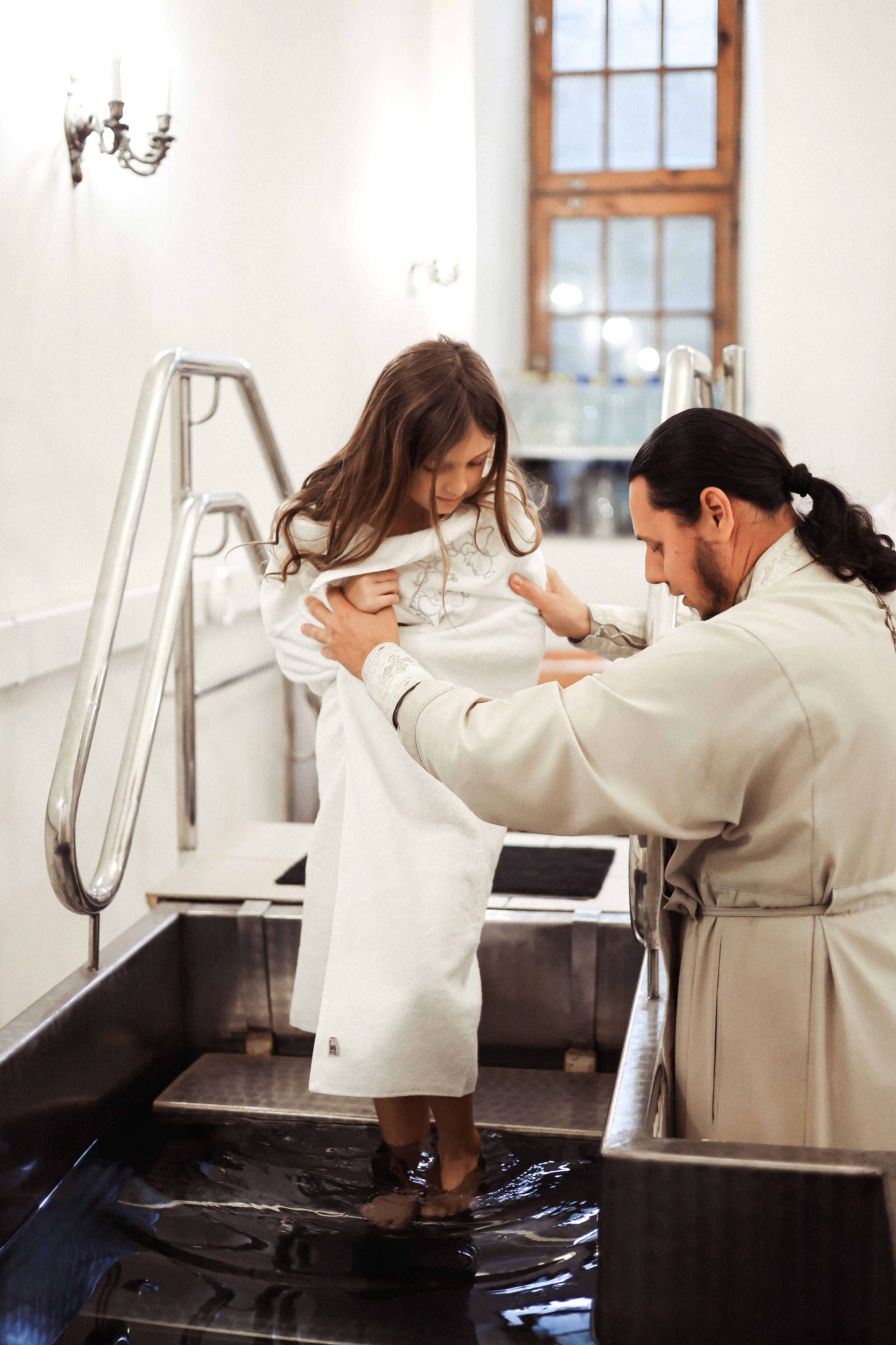 Крещение. Фотограф Елизавета Наумова