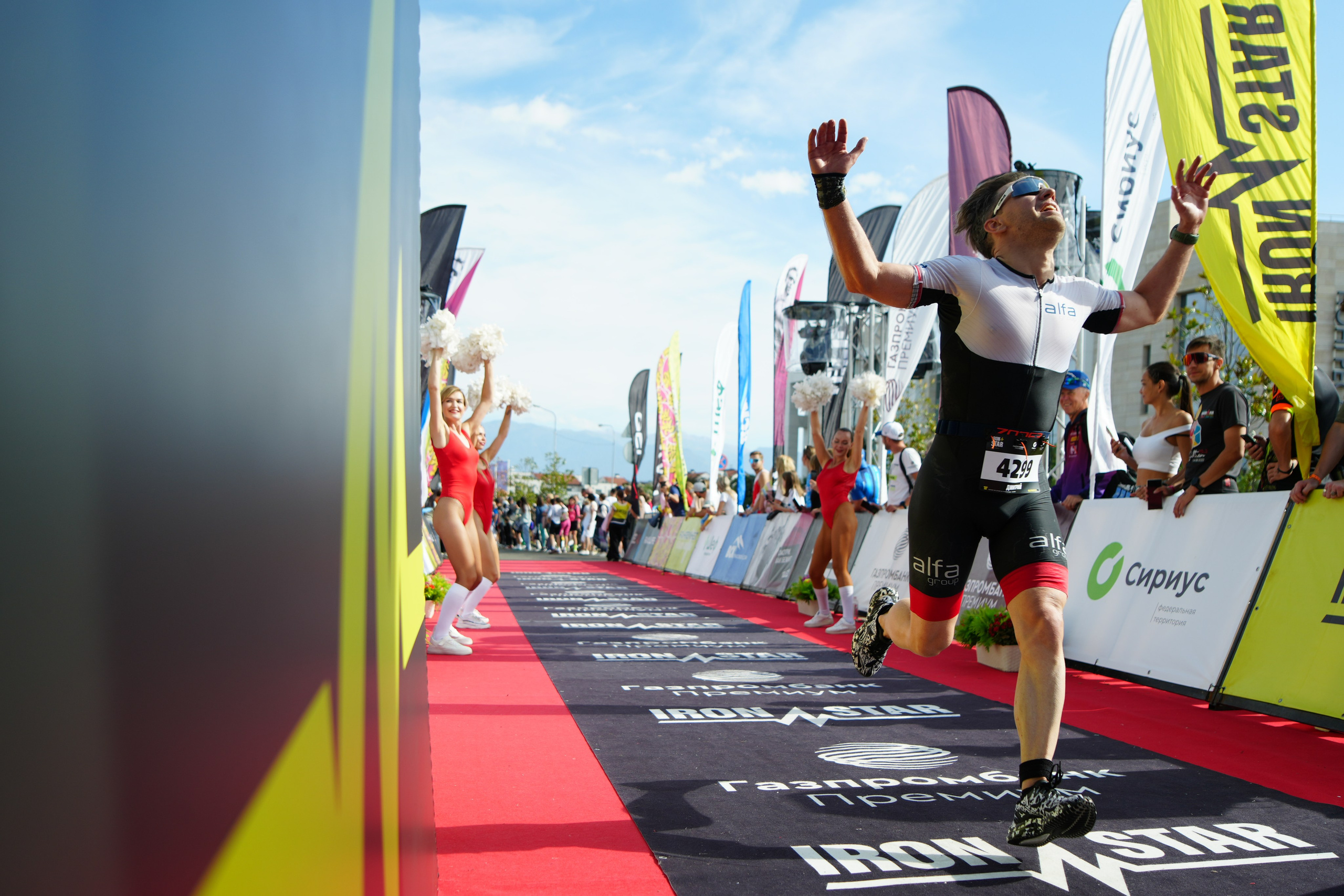 Фотоотчет партнерской интеграции для компании TELE2 на фестивале Ironstar. Репортажный фотограф в Красной Поляне и Сочи Павлюченко Екатерина