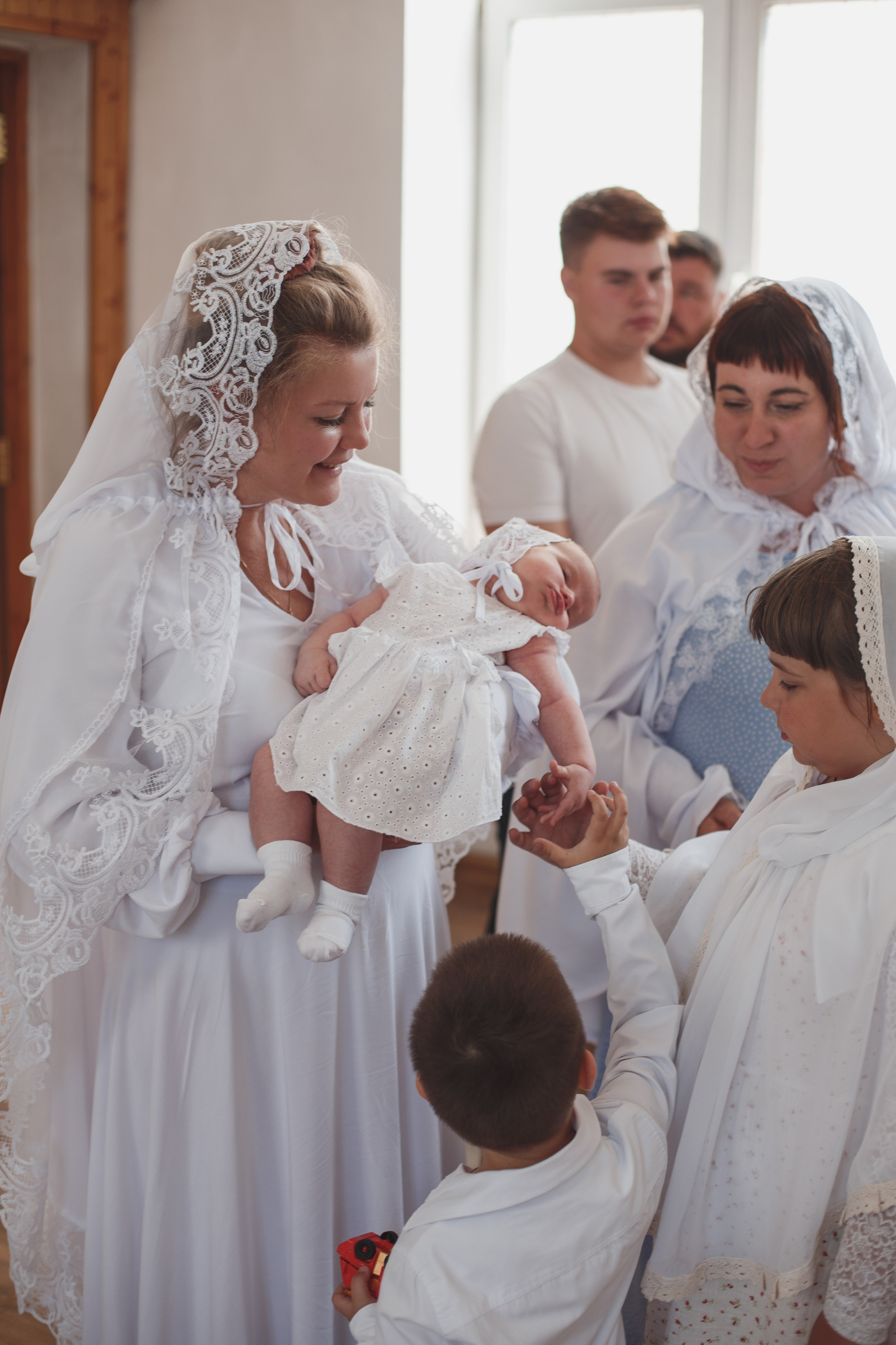Фотосъёмка таинства крещения в Белгороде. Свадебный и контент фотограф в Белгороде Ярослав Гаврилейченко