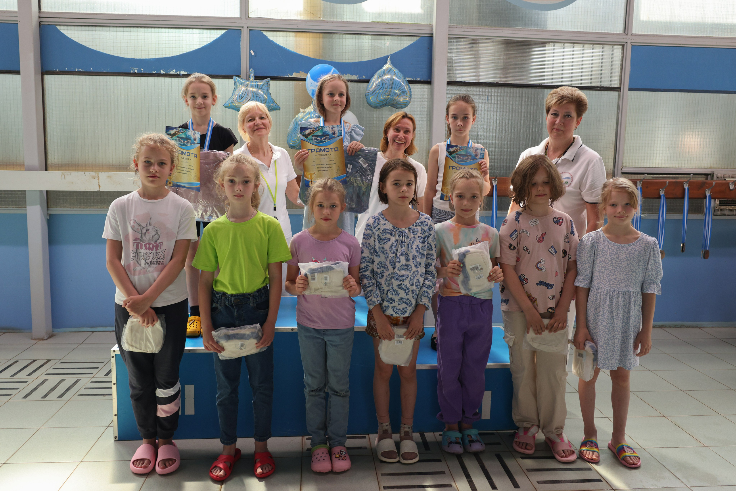 Веселый дельфин. Плавание. Дети 8-9 лет. Фотограф Александр Заломаев