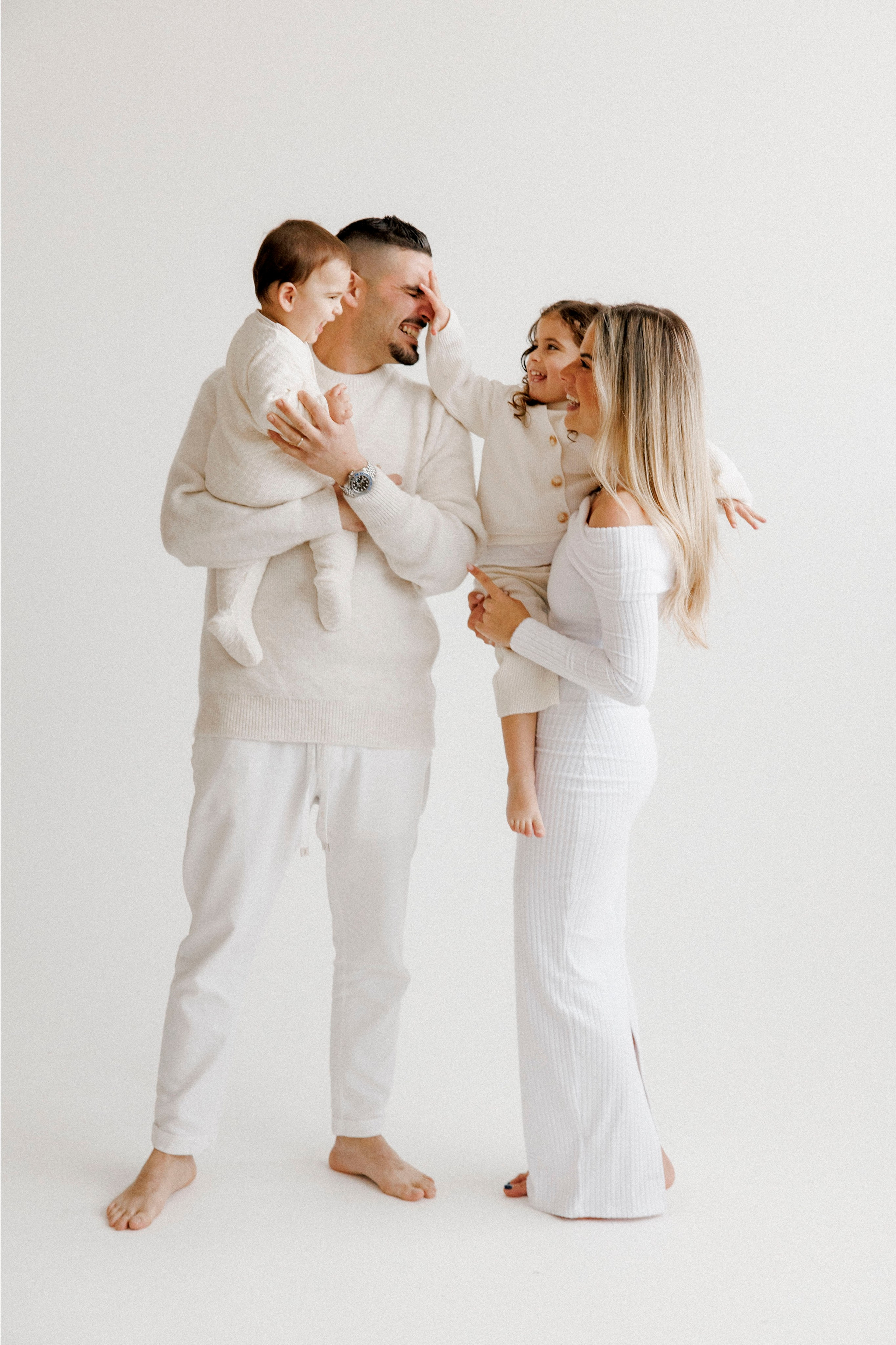 Family photoshoot in White Studio. Wedding and family photographer