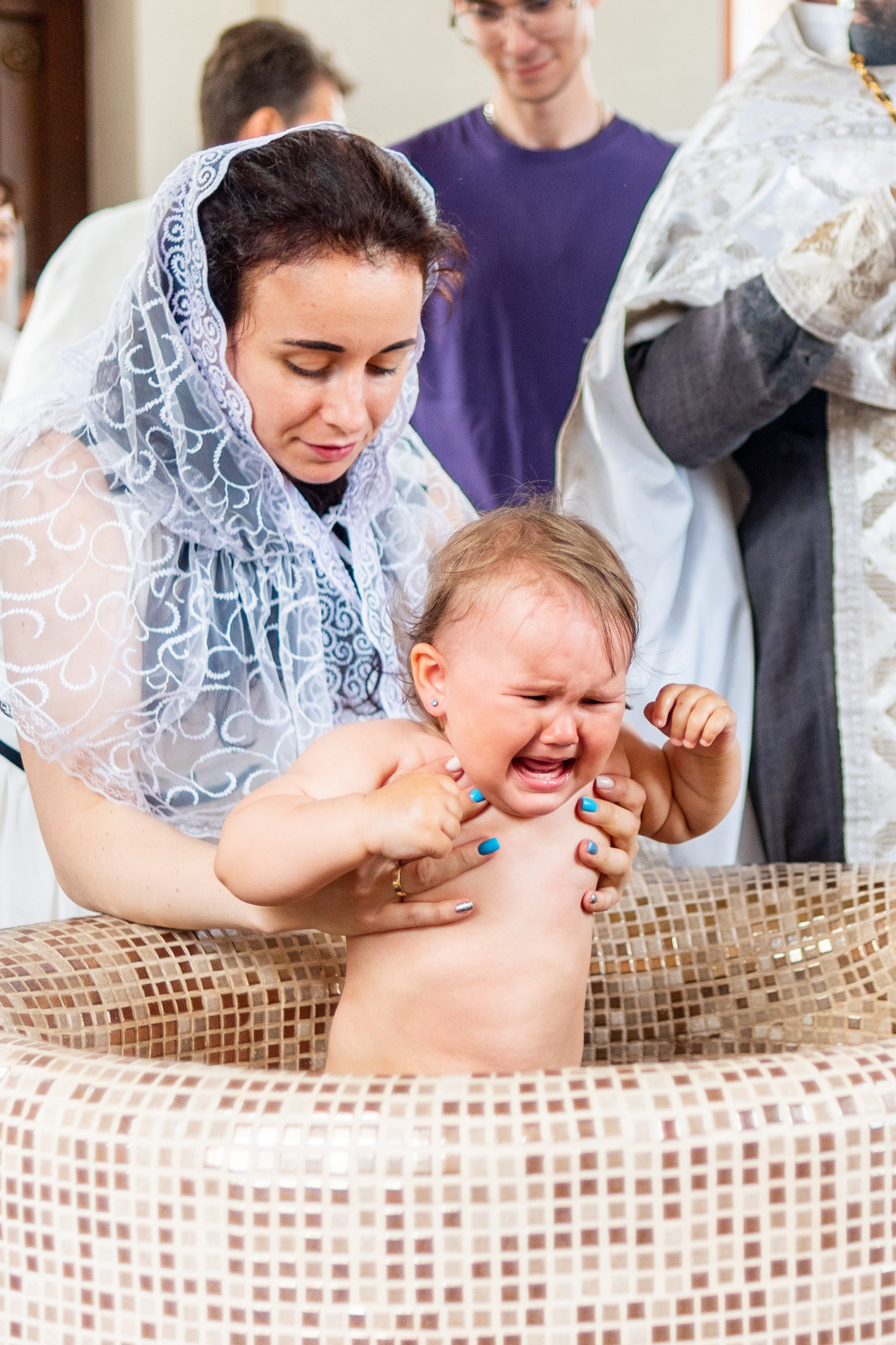 Крещение Ники. Фотограф Юлия Попова