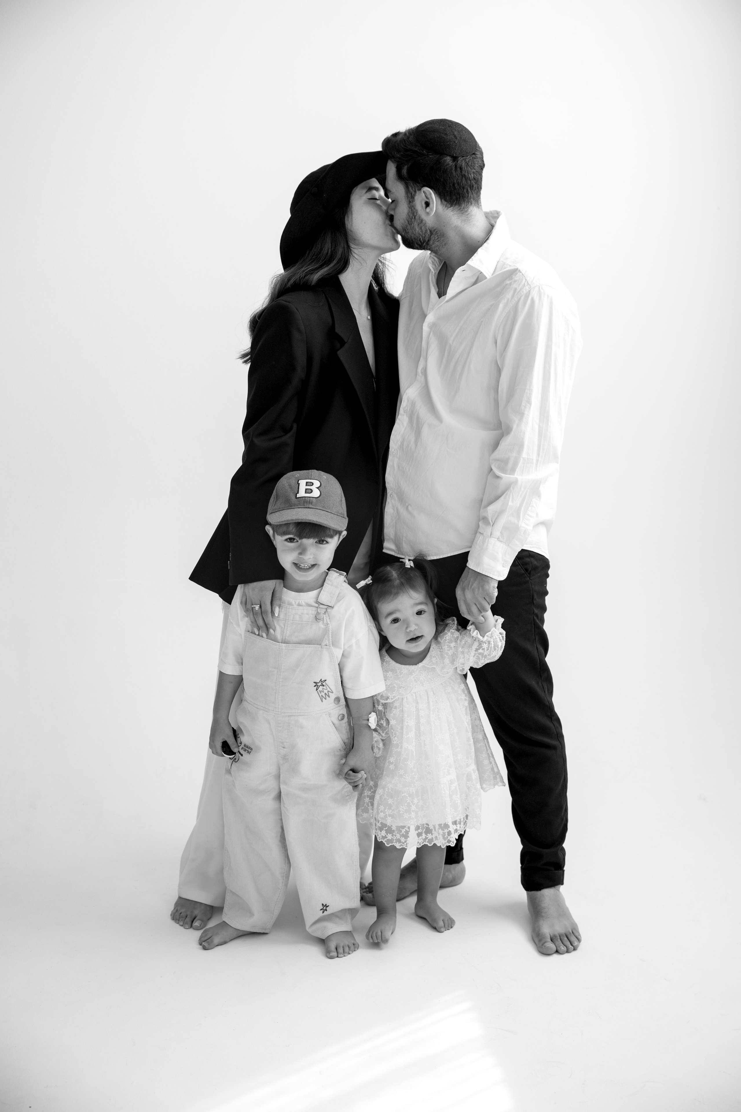Family photoshoot inside the studio. Wedding and family photographer