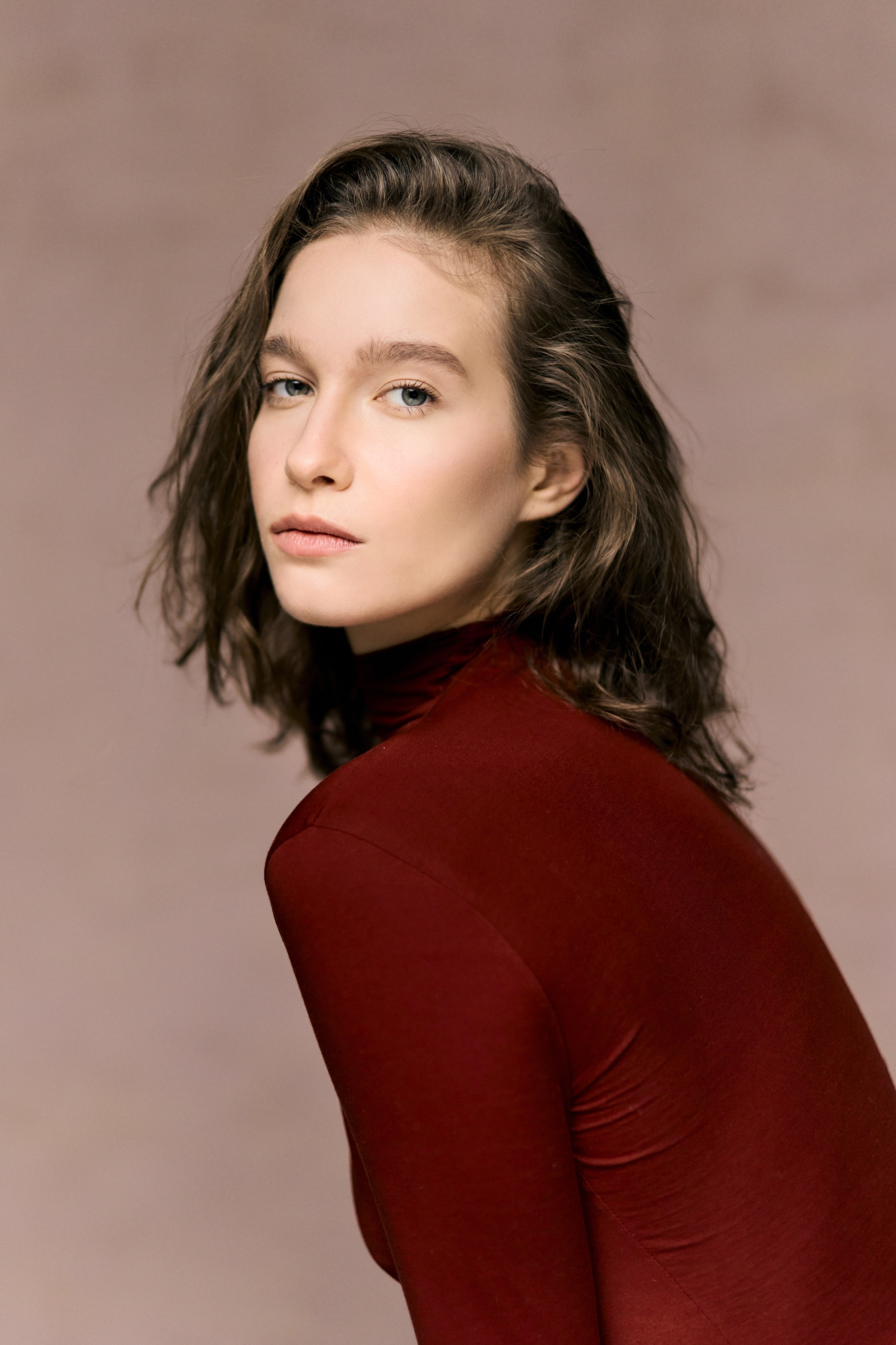 Portrait of photographer and model Anasta Fo in a red jumper