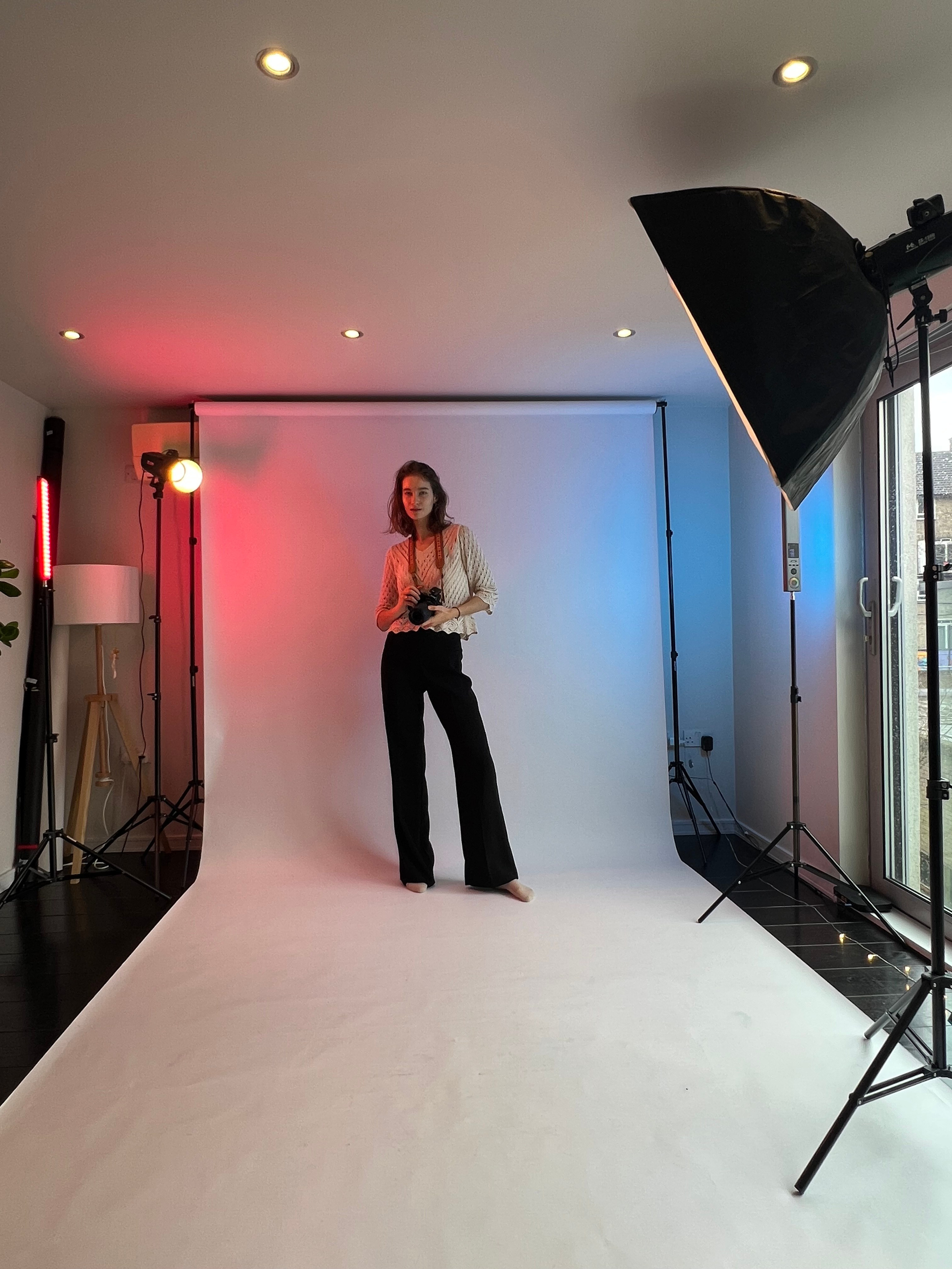 Behind the scenes at a studio shoot with coloured lighting