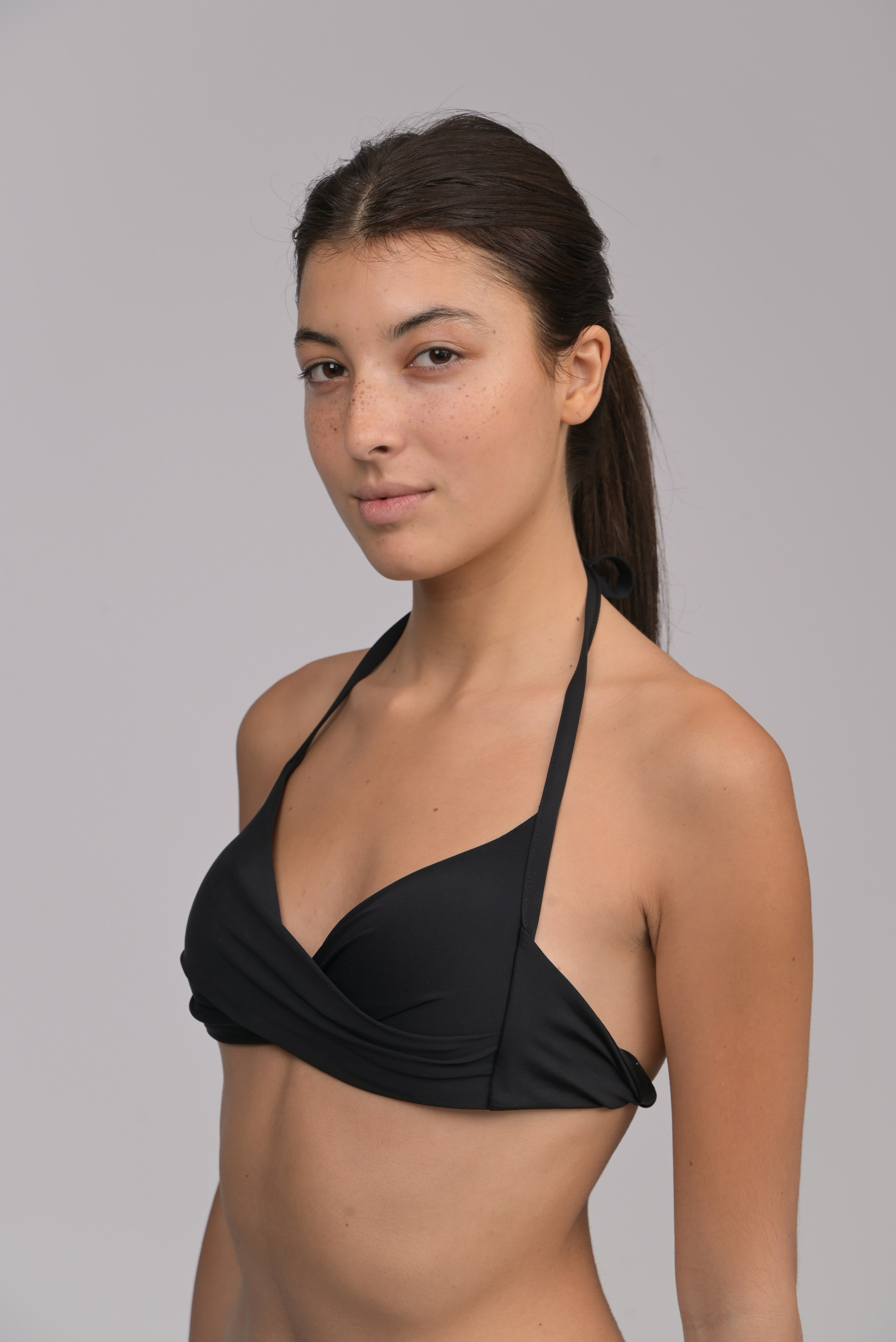 Natural model portrait in black swimwear