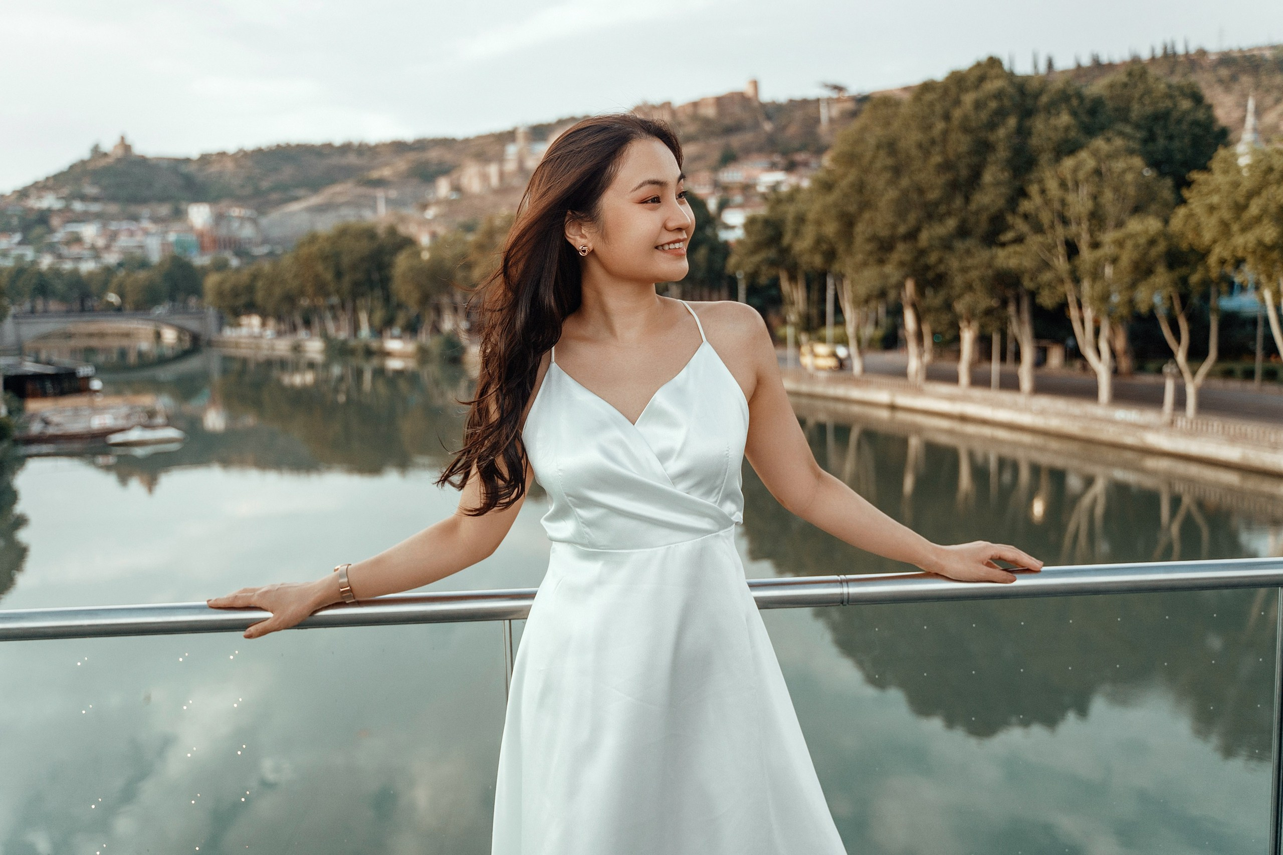 Alaeddine & Matika on the Peace Bridge in Tbilisi. Photographer Sergey Otkrytyi in Batumi & Tbilisi