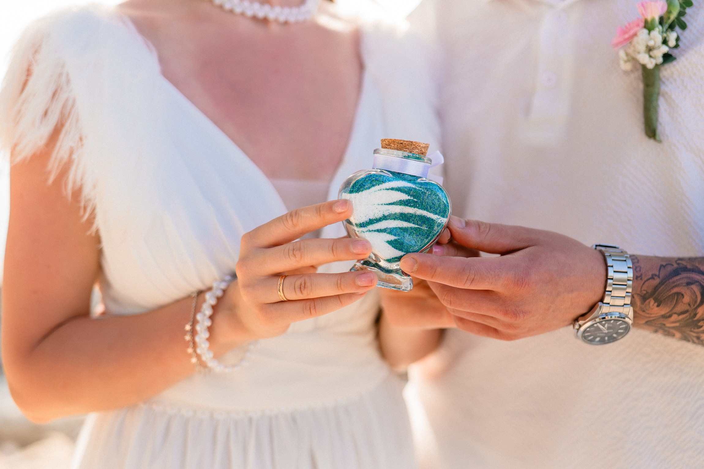 Bride and groom during a romantic beach wedding ceremony on Koh Samui, Thailand, surrounded by tropical scenery and ocean views