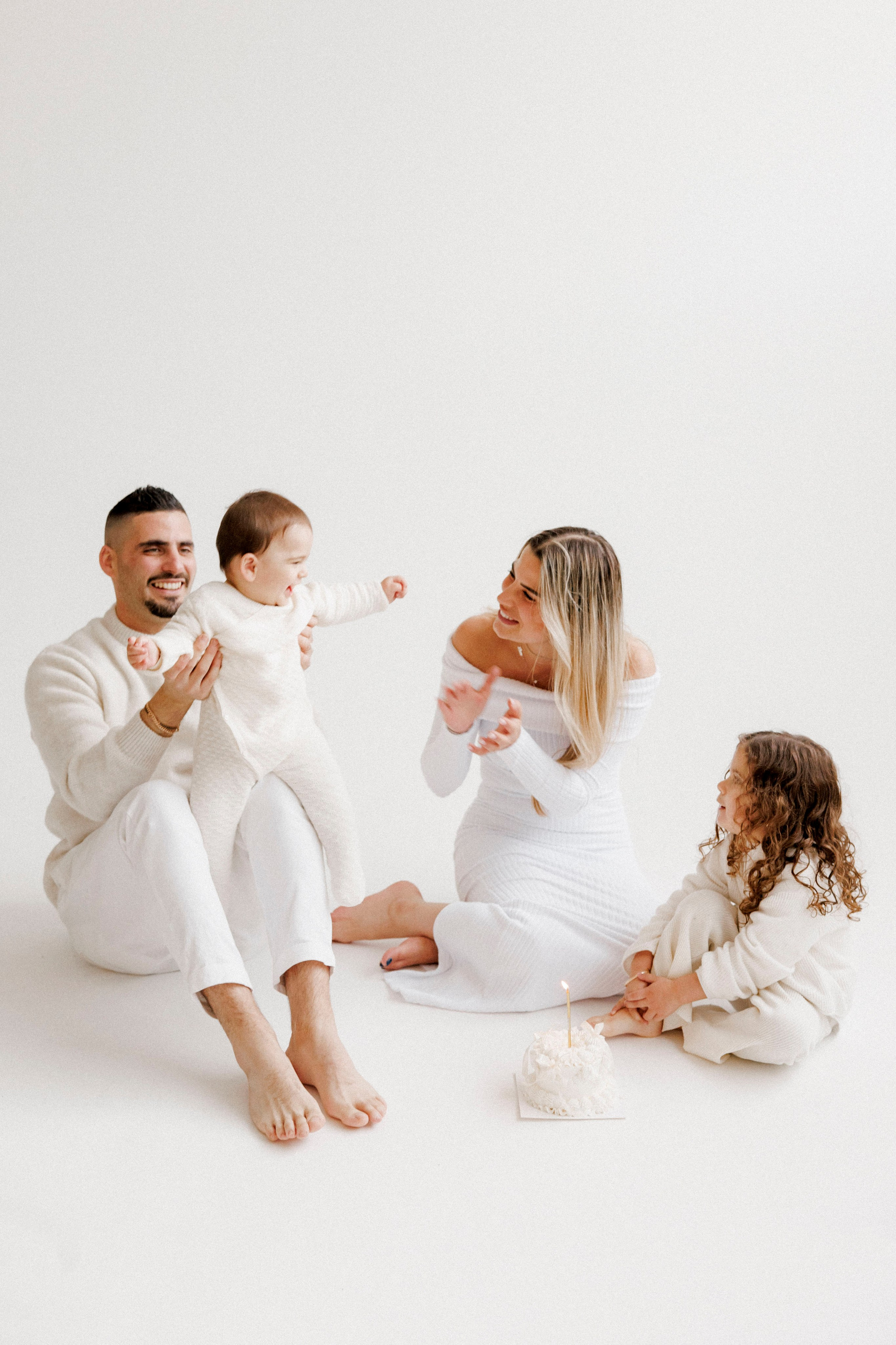 Family photoshoot in White Studio. Wedding and family photographer