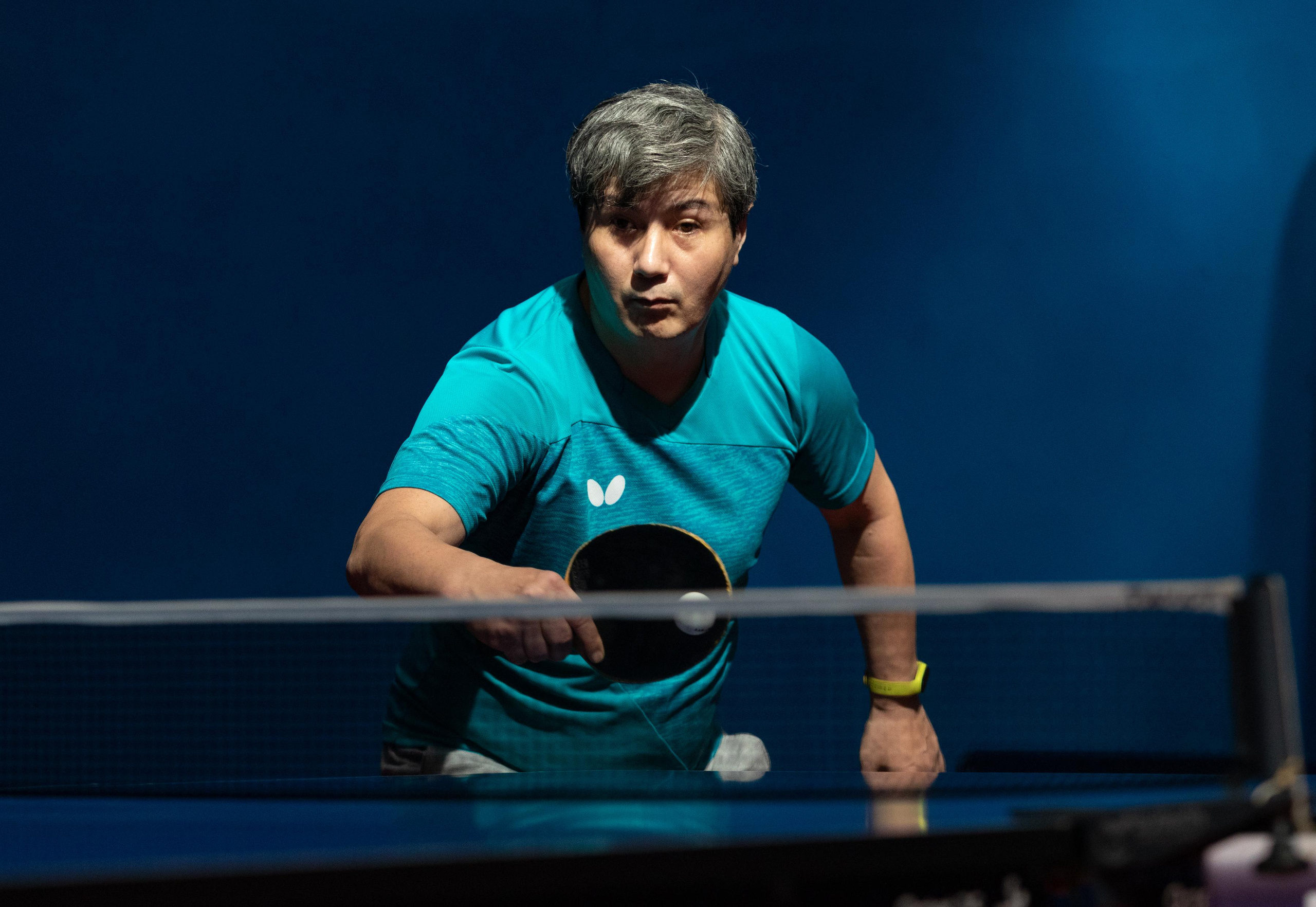 спортивный фотограф Анна Зиновьева фотографирует настольный теннис