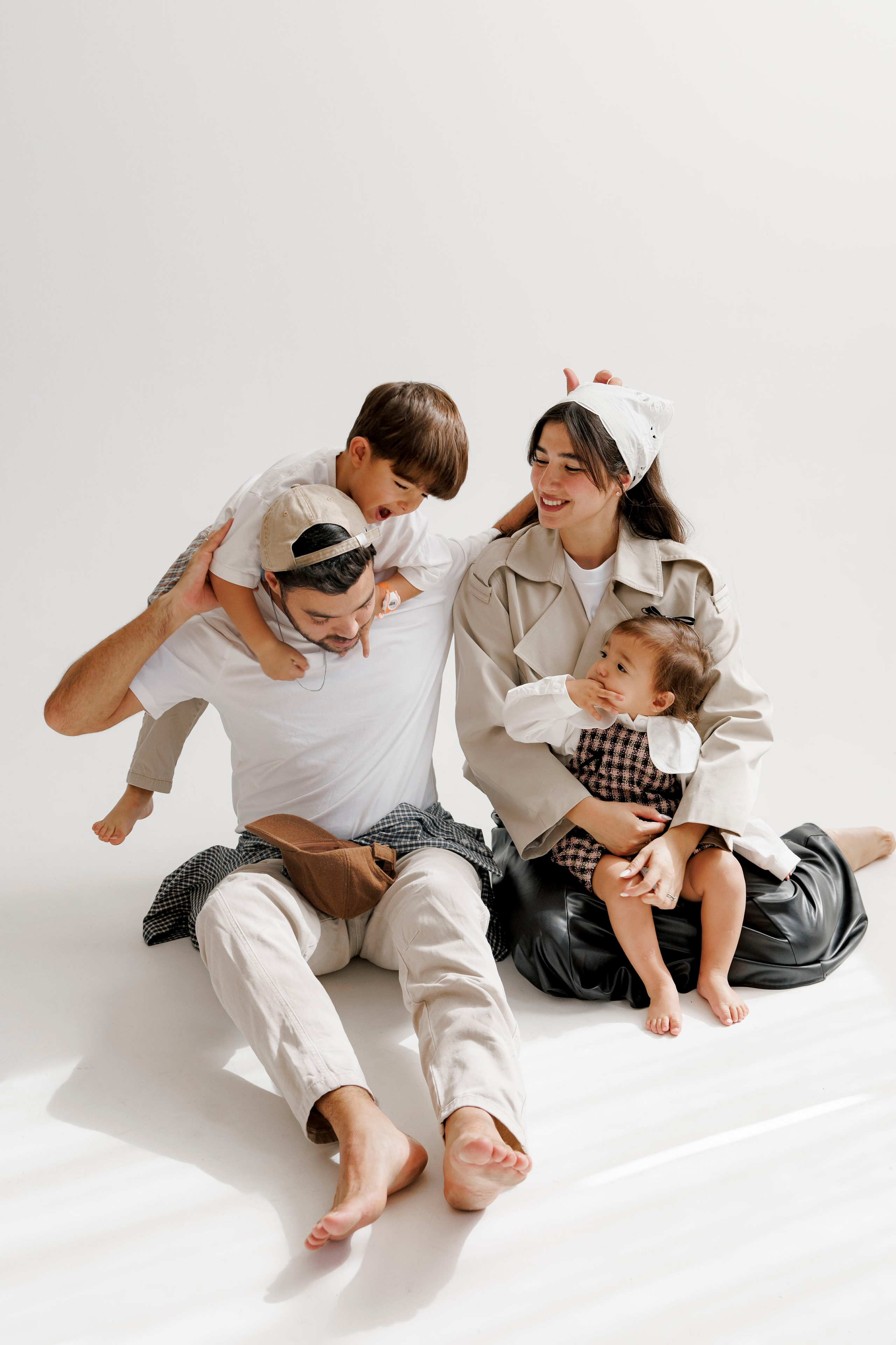 Family photoshoot inside the studio. Wedding and family photographer