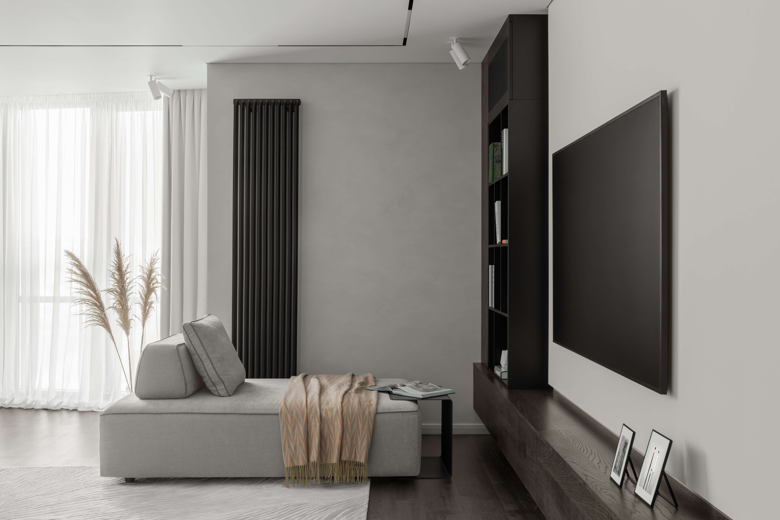 Современная гостиная в Астане, проект Astudio — модульный диван Samoa, телевизор Samsung The Frame, встроенный стеллаж и радиатор КЗТО.