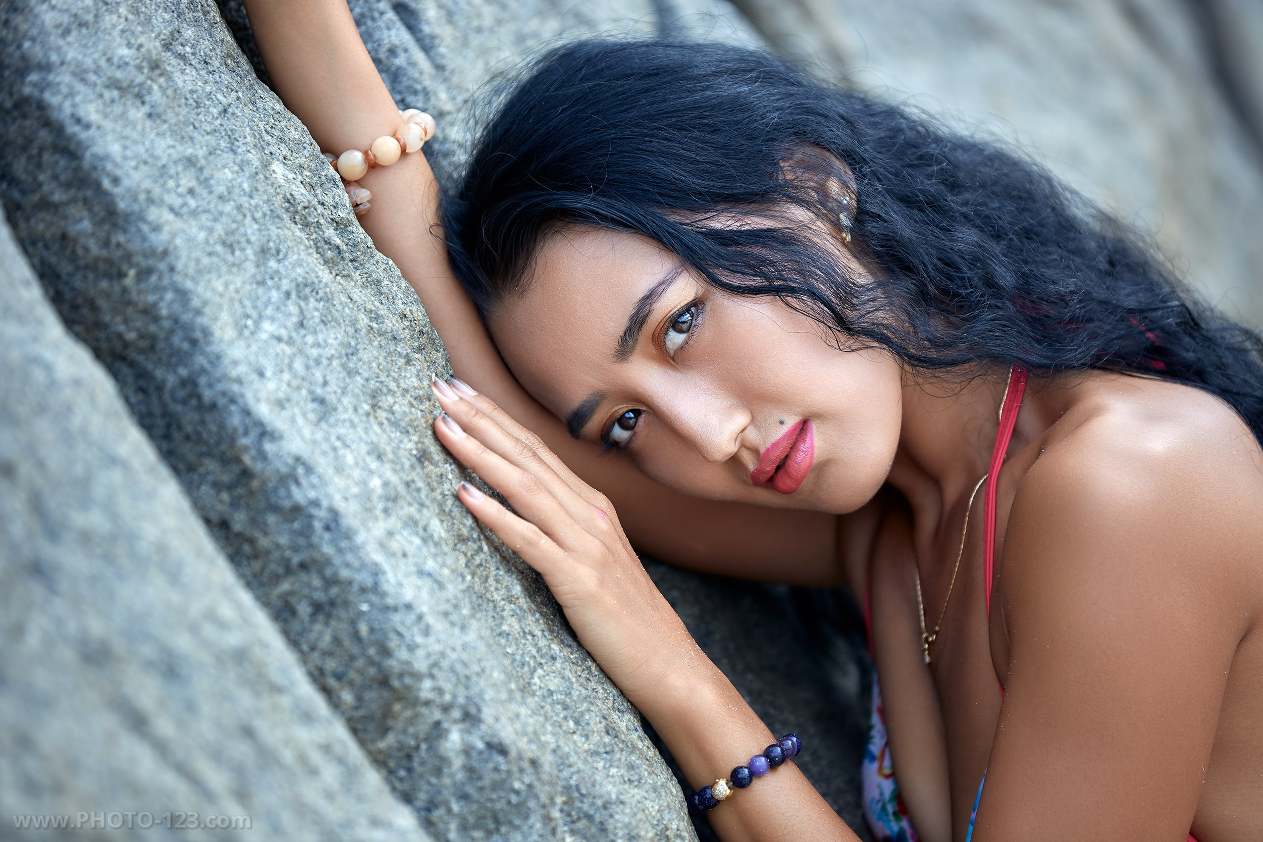 Creative close-up headshot on the coastal cliffs of Nha Trang bay for a professional portfolio.