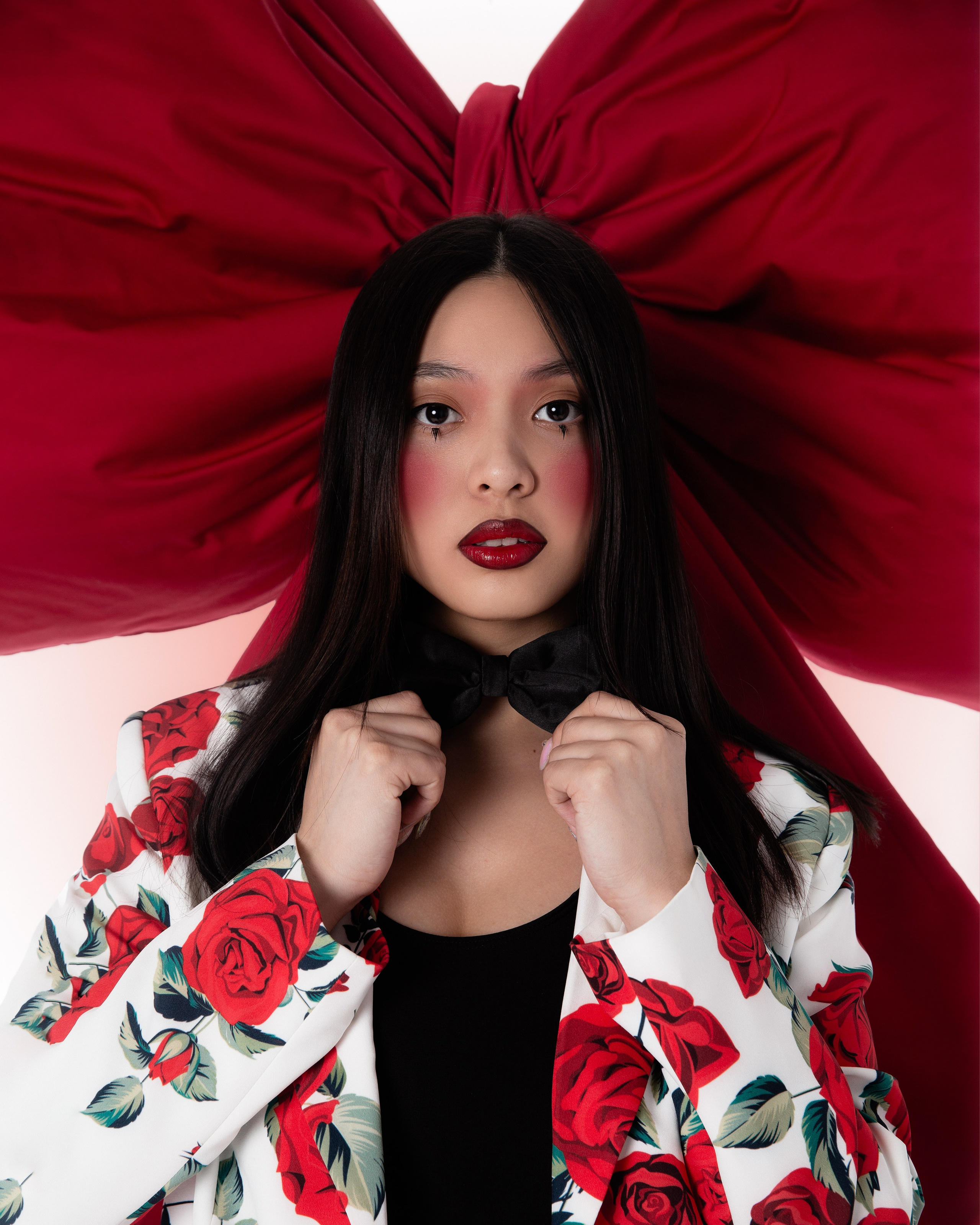 Bow. Photographer. Producer. Retoucher