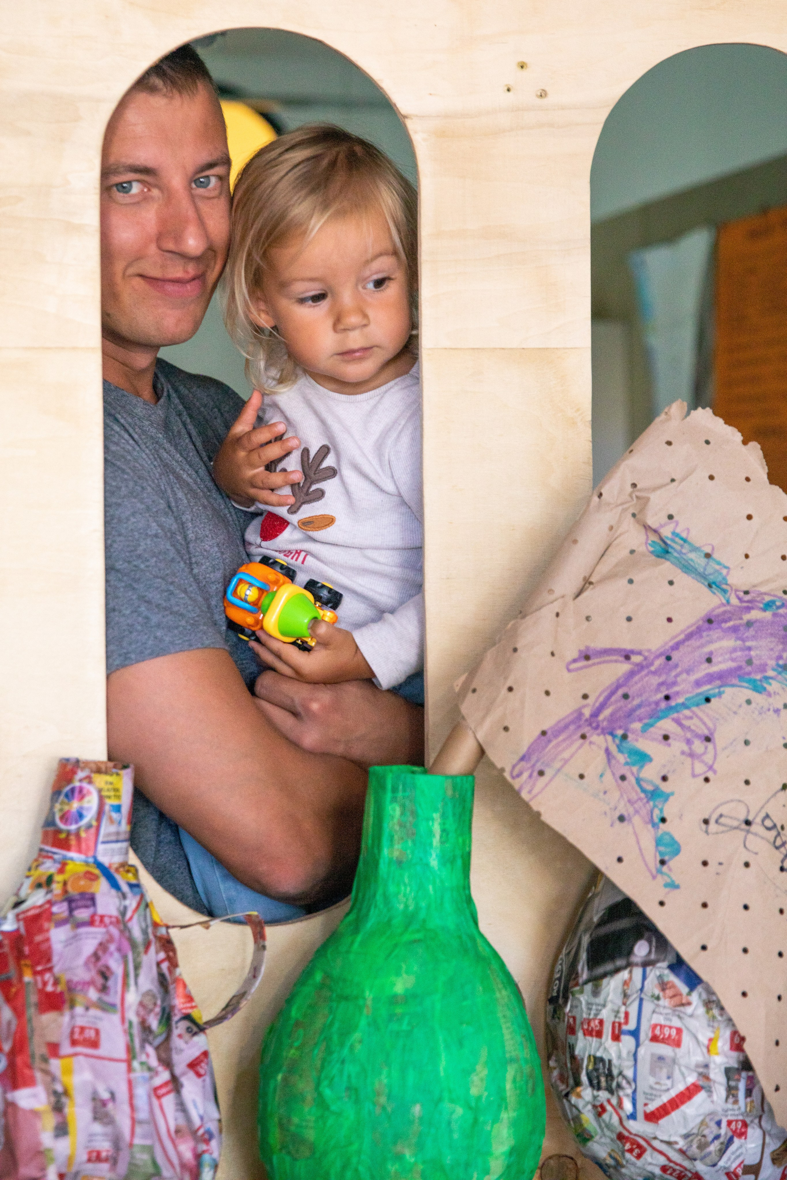 Father and daughter in a creative studio
