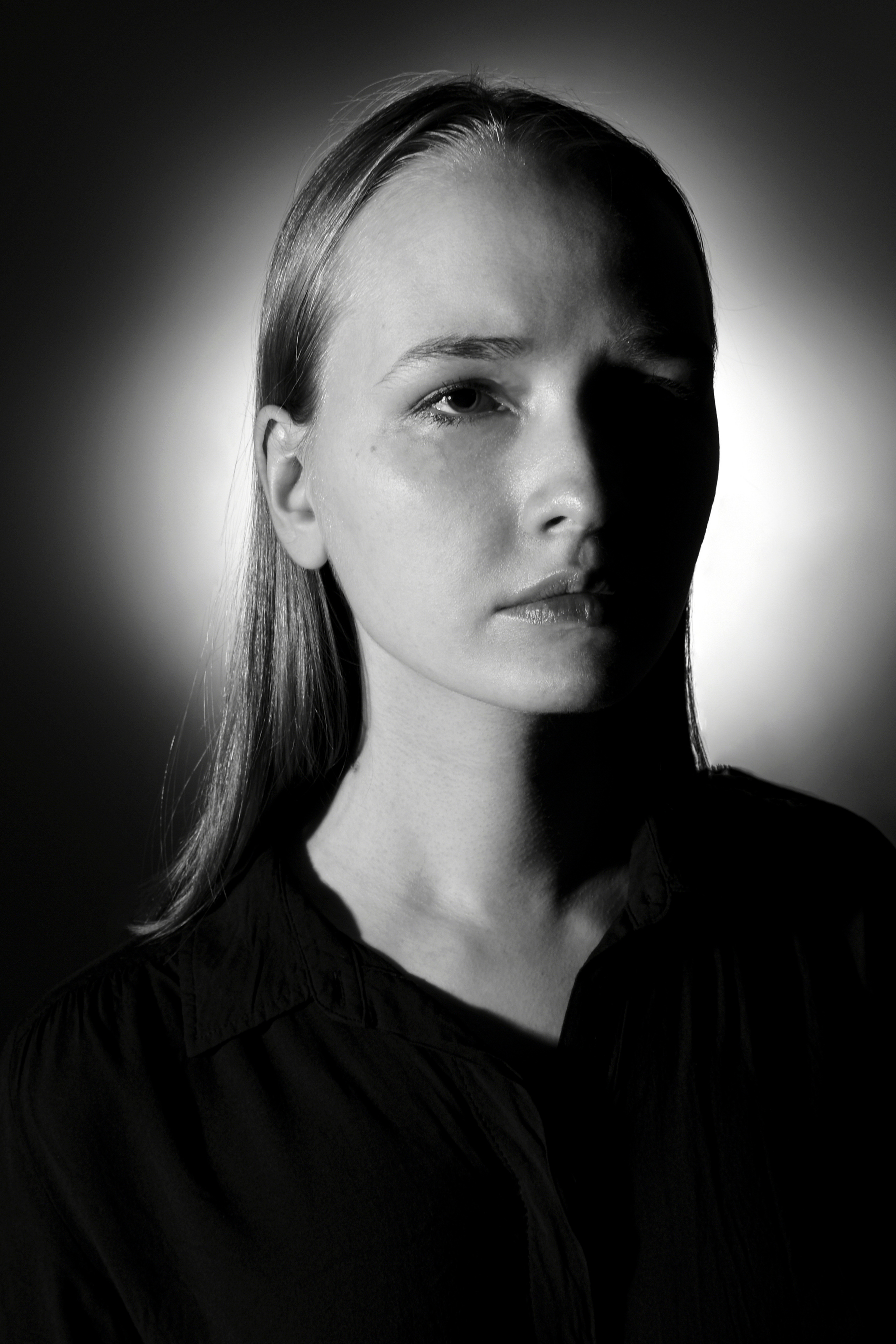 Black and white portrait made in a studio two faced