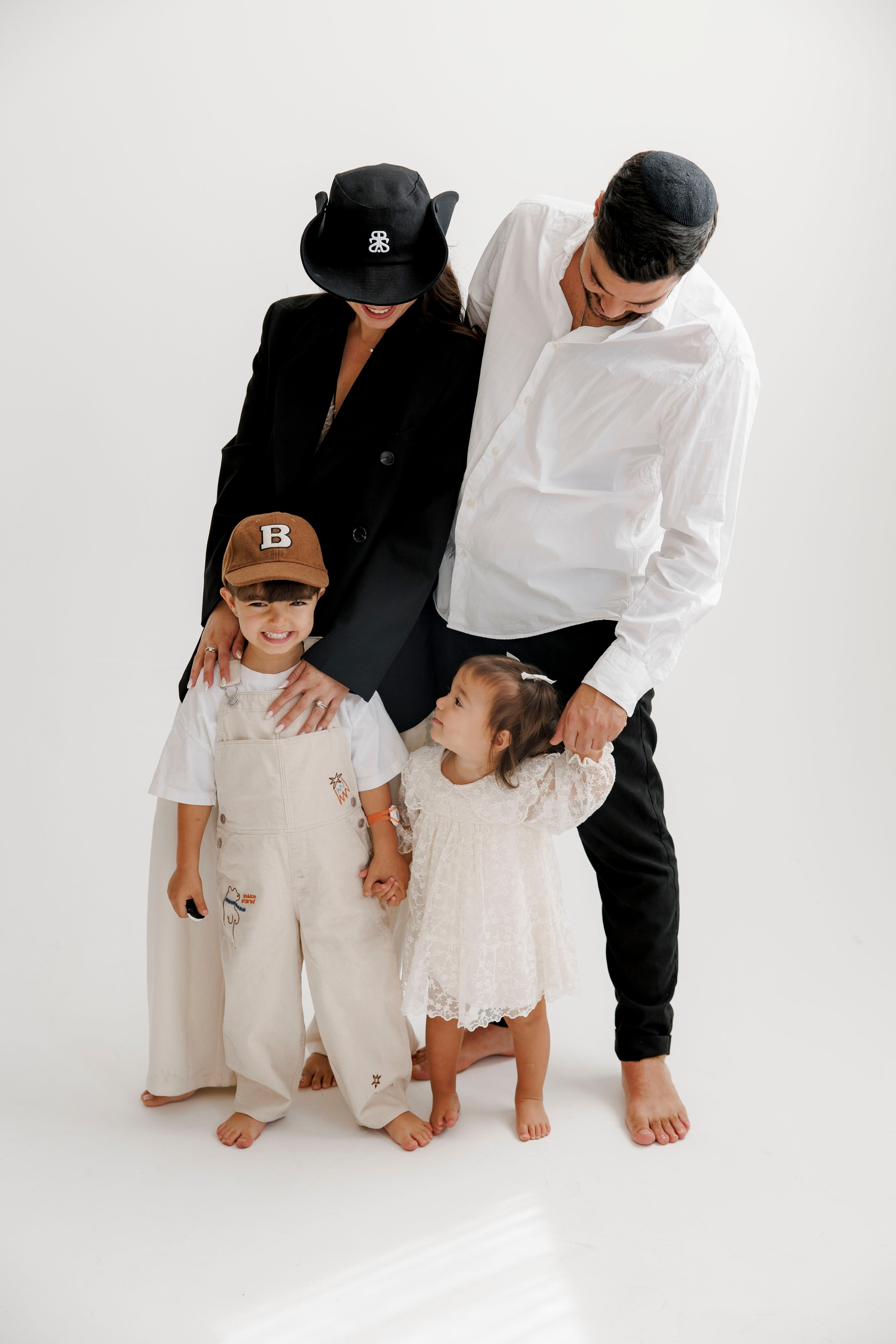 Family photoshoot inside the studio. Wedding and family photographer