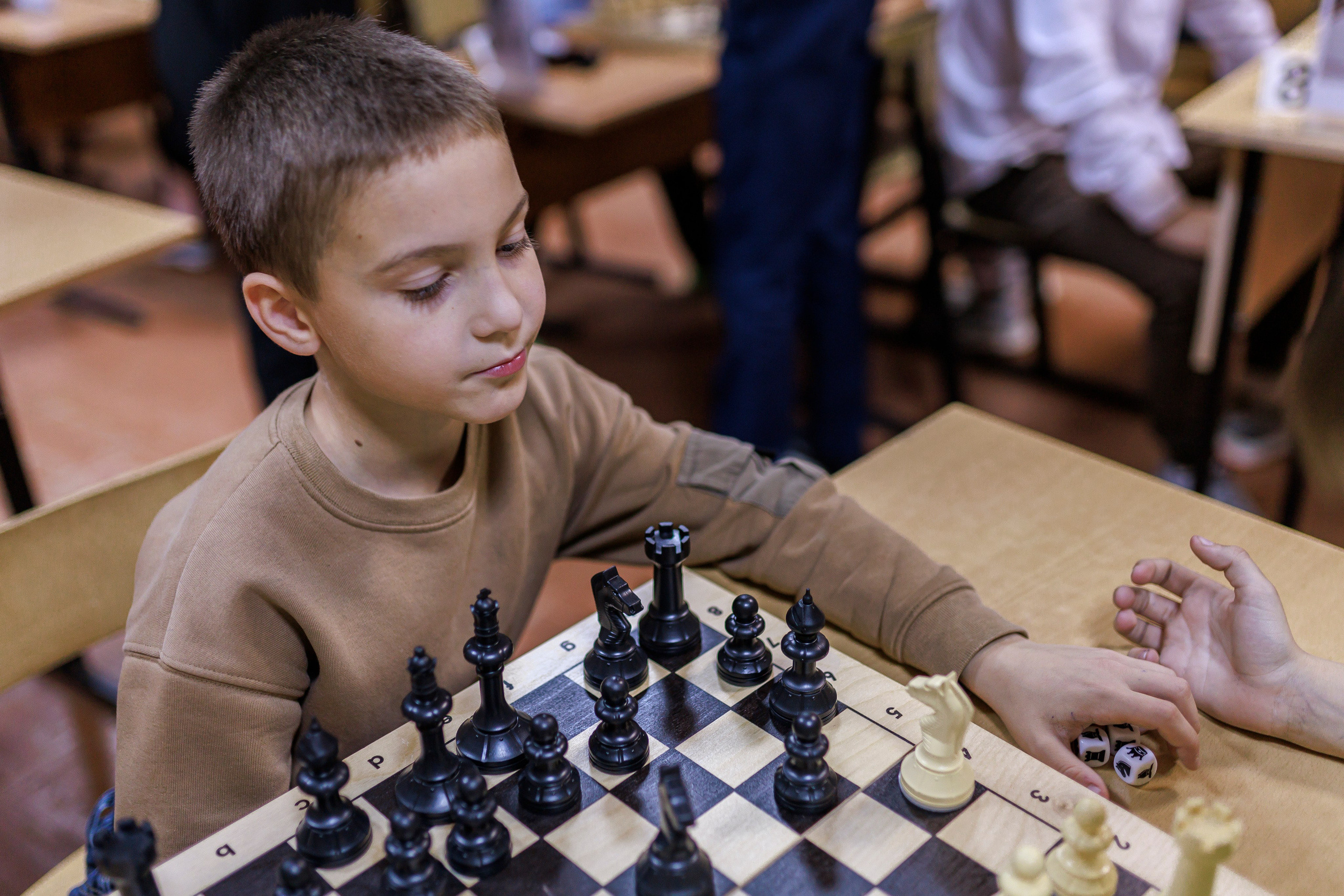 Репортажная сьёмка игры в шахматы в детском доме. Семейный и детский фотограф в Рязани Васюгова Мария