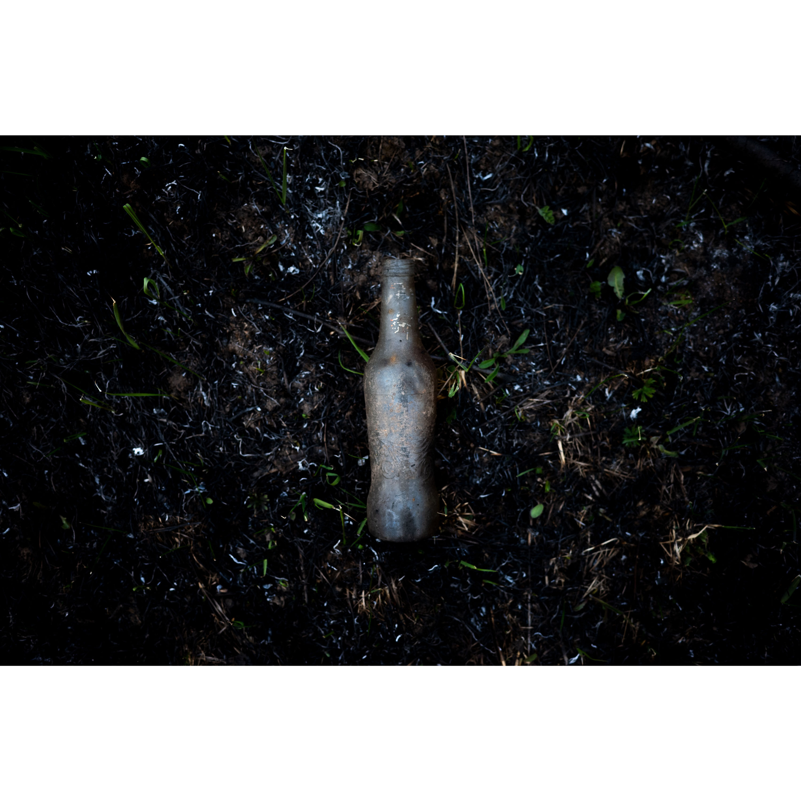 Сгоревшая бутылка.