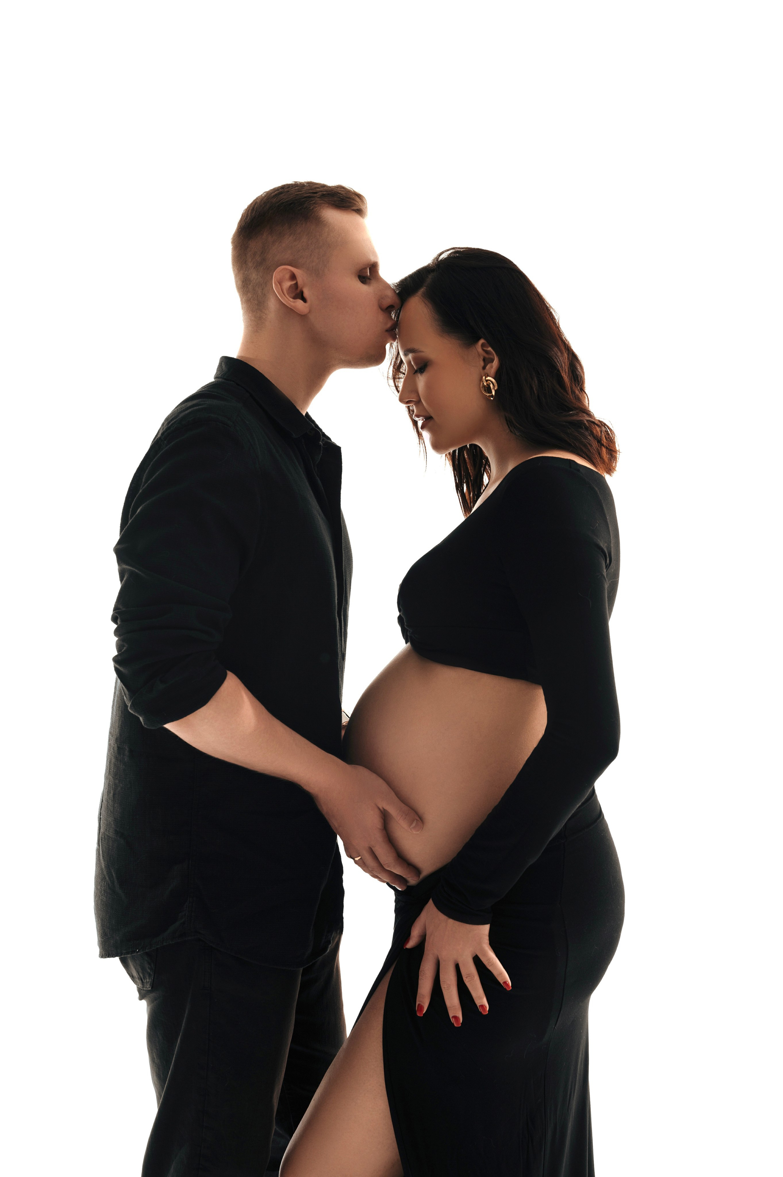 Муж и жена на фотосессии в ожидании чуда