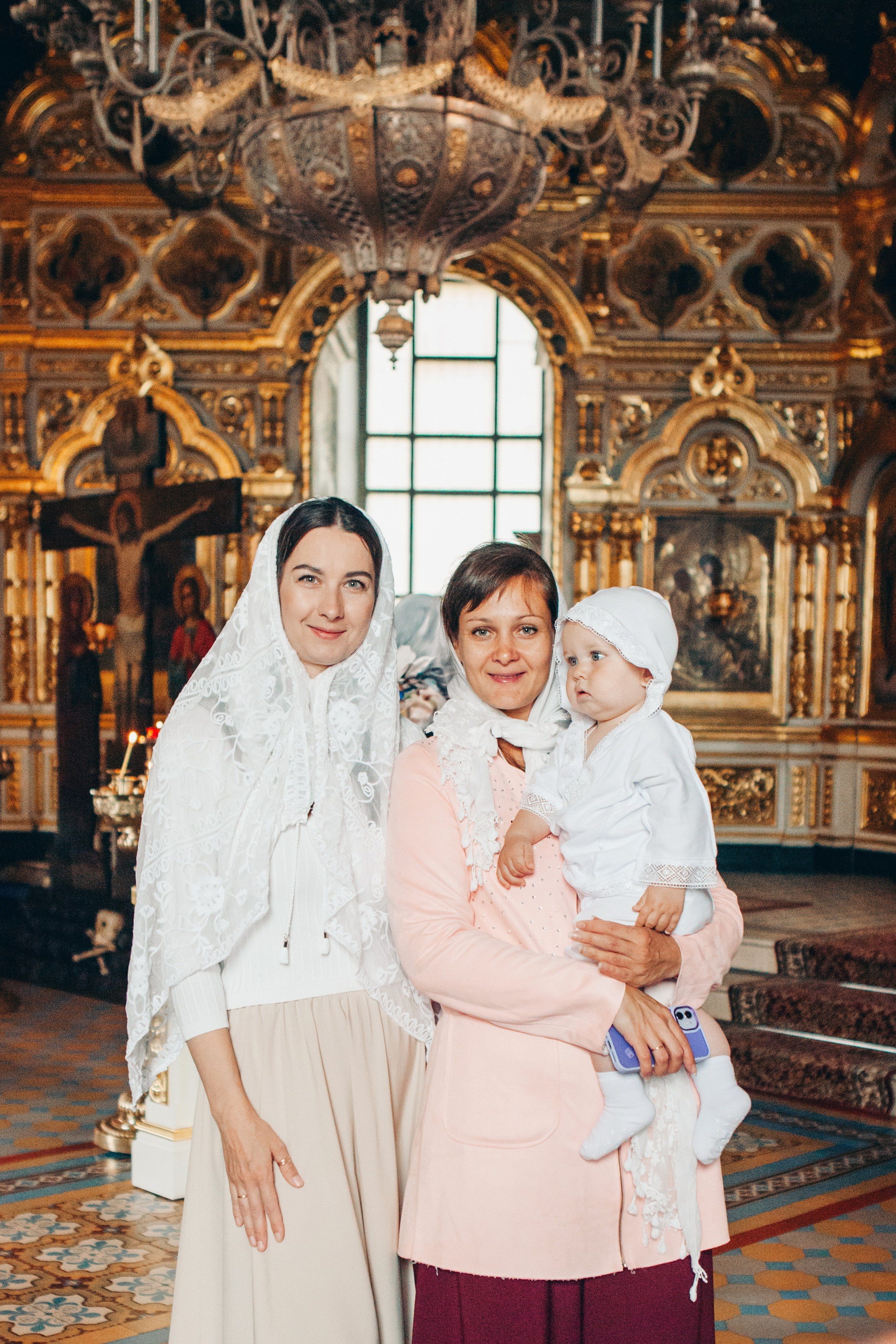 Крещение ребенка в церкви. Фотограф Ольга Ефремова