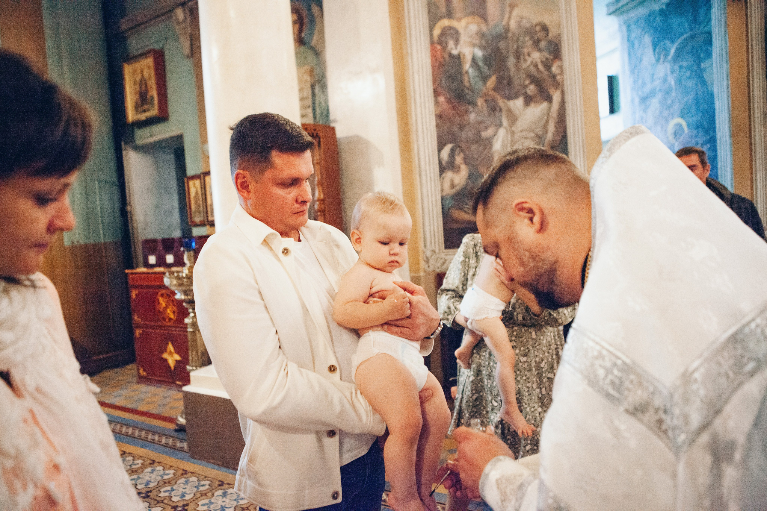 Крещение ребенка в церкви. Фотограф Ольга Ефремова