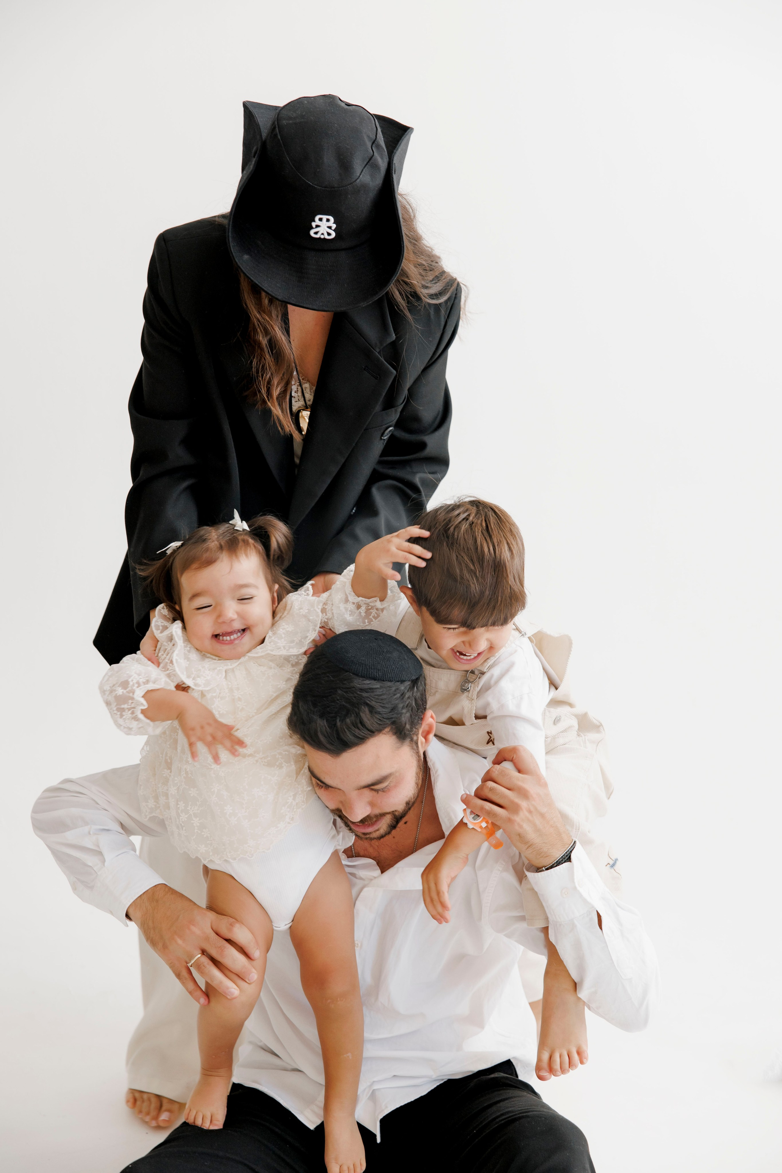 Family photoshoot inside the studio. Wedding and family photographer