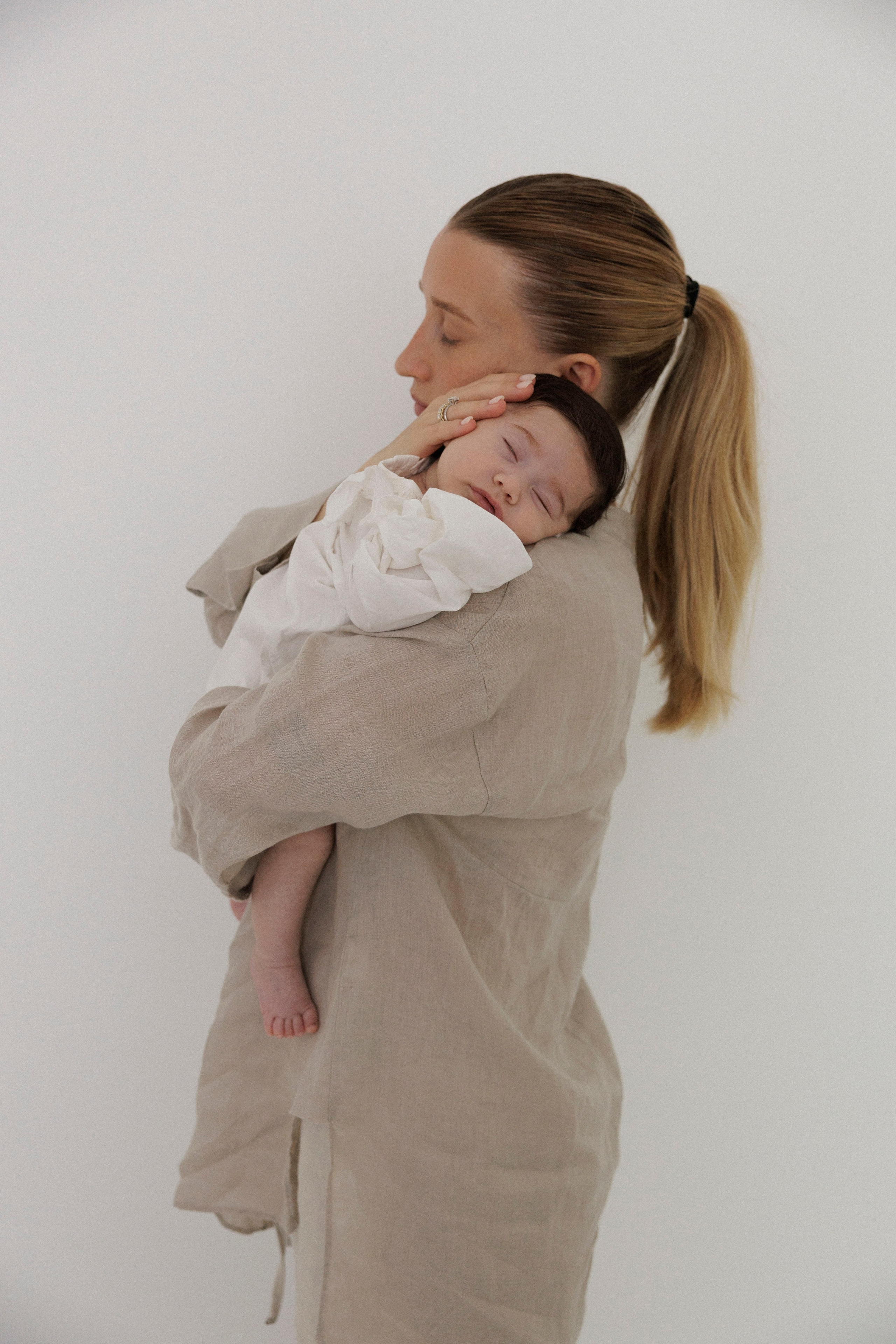 New born family photoshoot at home. Wedding and family photographer