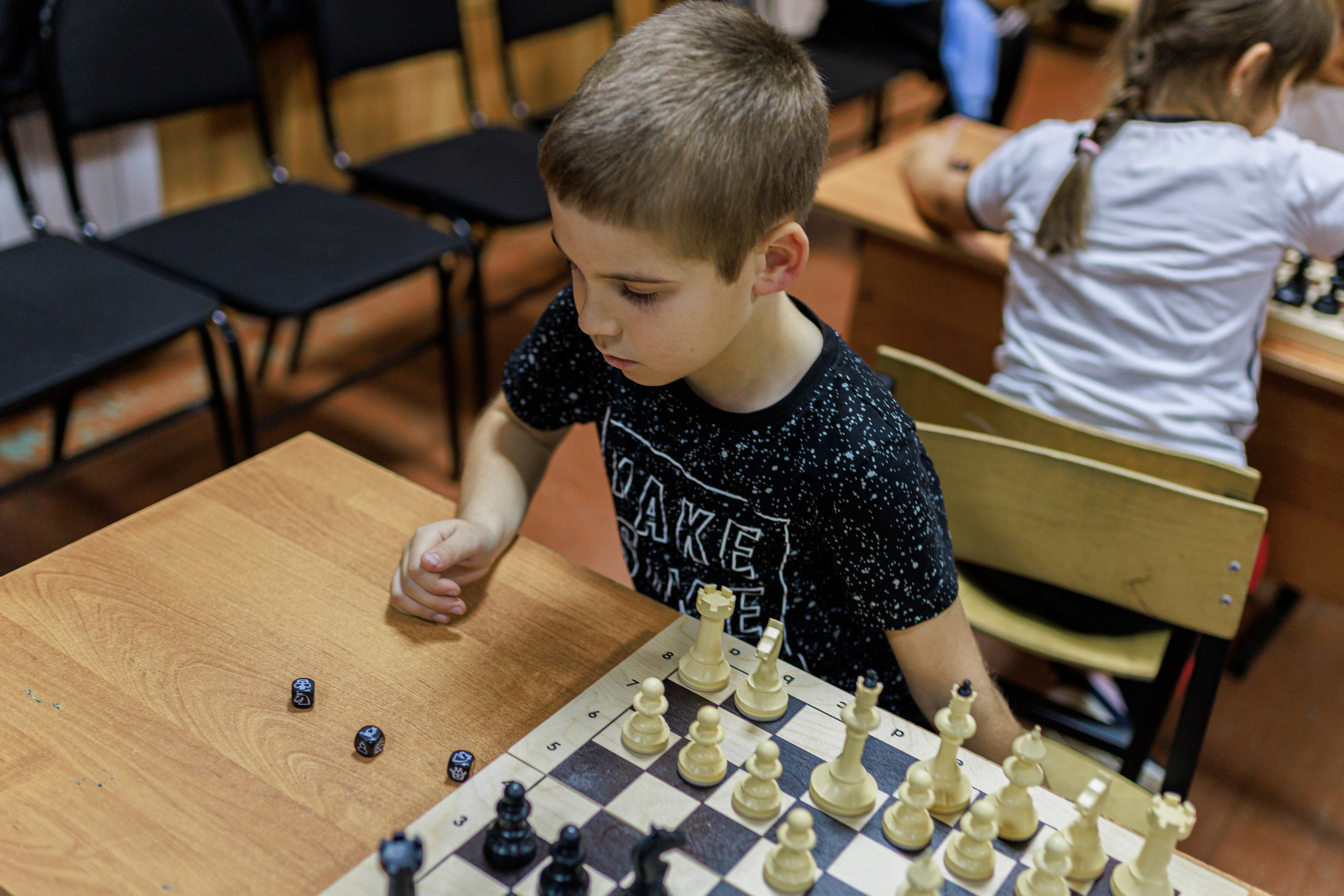 Репортажная сьёмка игры в шахматы в детском доме. Семейный и детский фотограф в Рязани Васюгова Мария