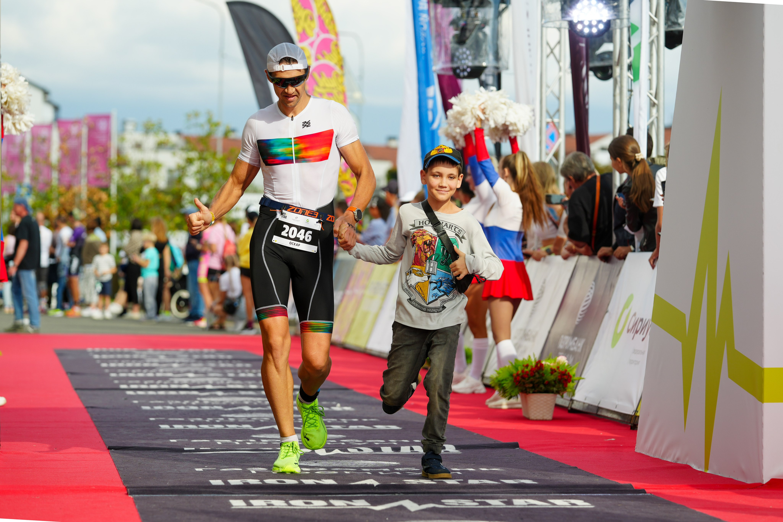 Фотоотчет партнерской интеграции для компании TELE2 на фестивале Ironstar. Репортажный фотограф в Красной Поляне и Сочи Павлюченко Екатерина