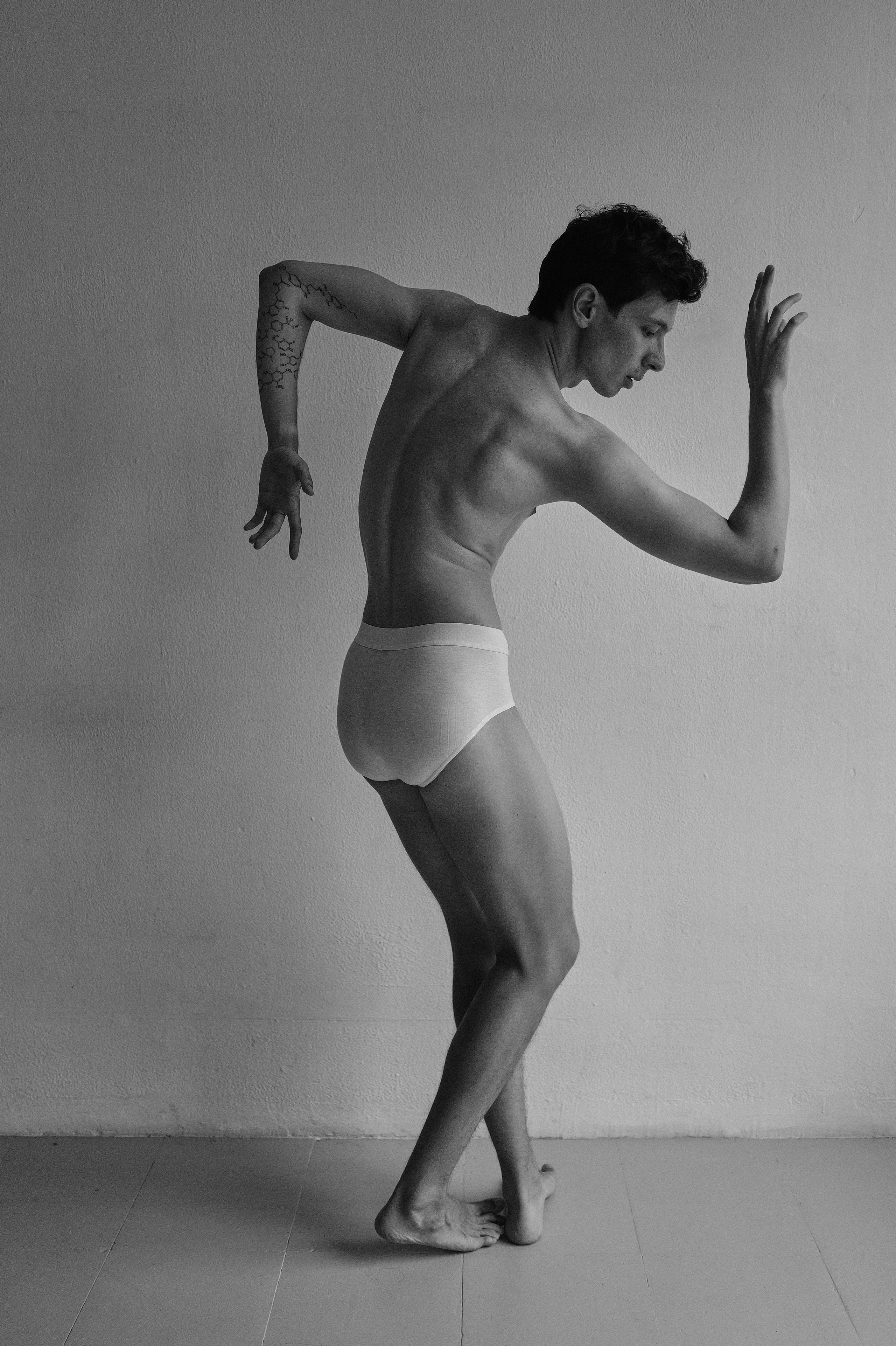 Fine art Barcelona studio portrait capturing male body form and elegance