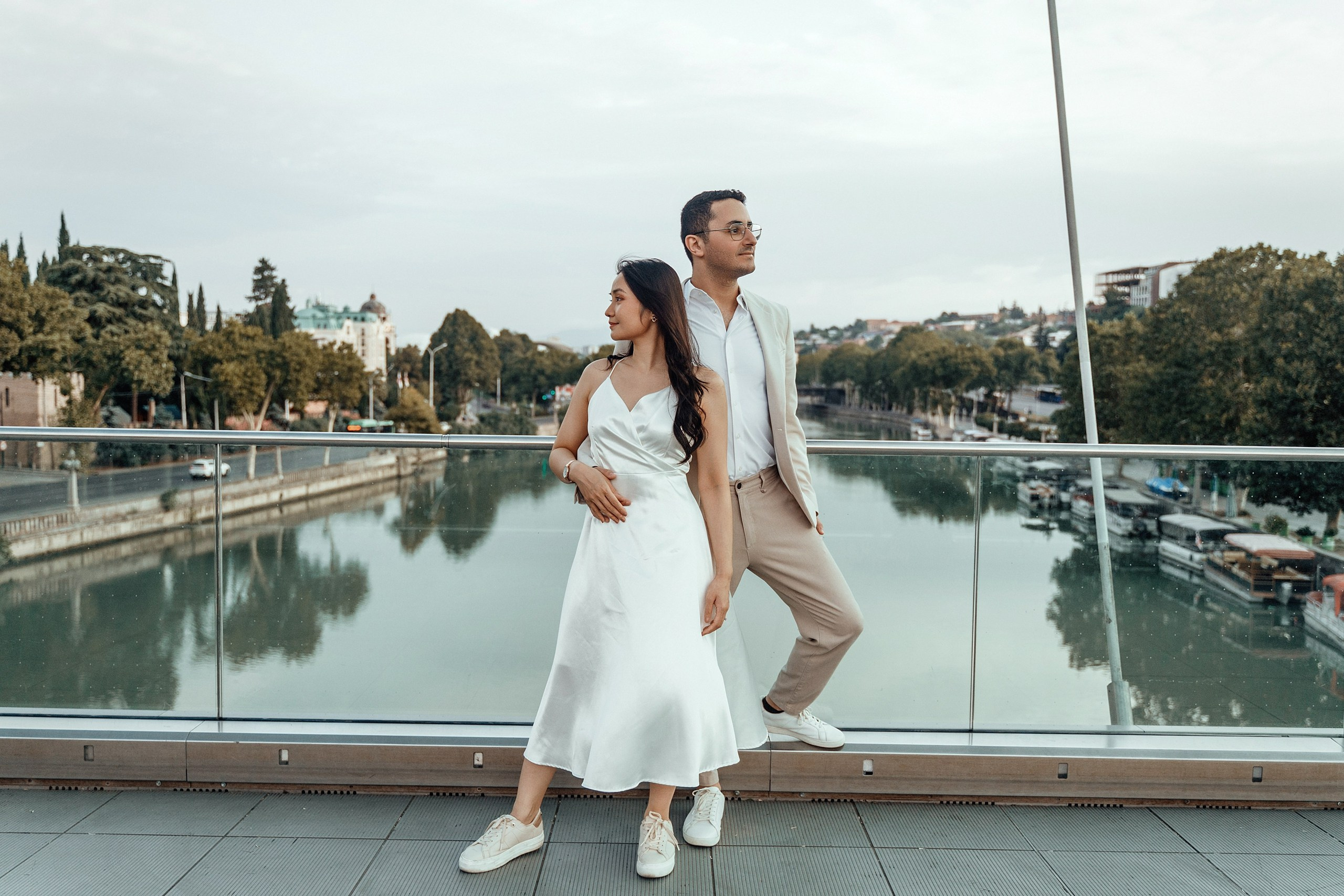 Alaeddine & Matika on the Peace Bridge in Tbilisi. Photographer Sergey Otkrytyi in Batumi & Tbilisi